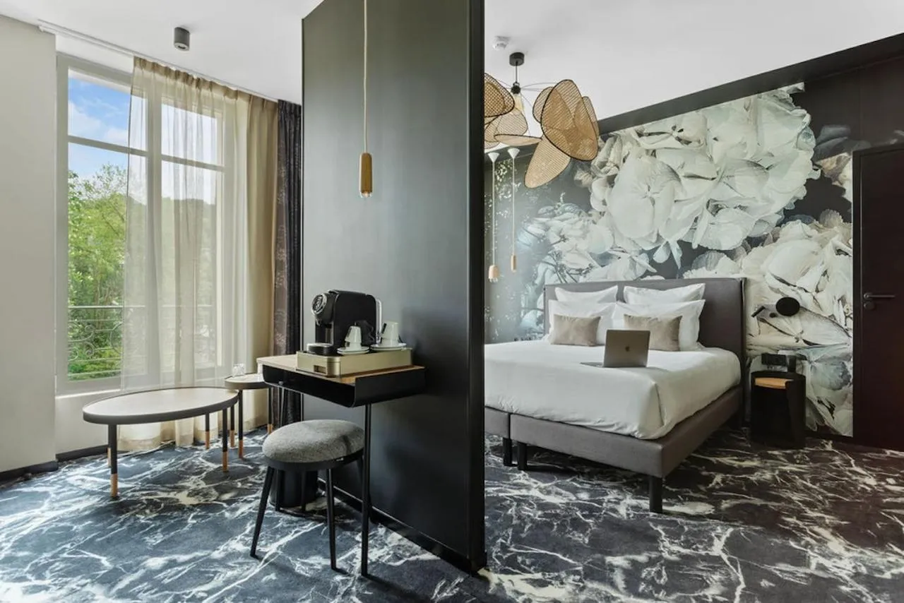 Bed in LE RITUEL HOTEL & SPA