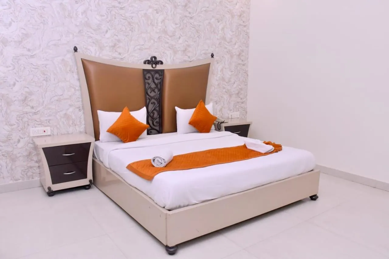 Bed in Nirmal Hotel And Resort