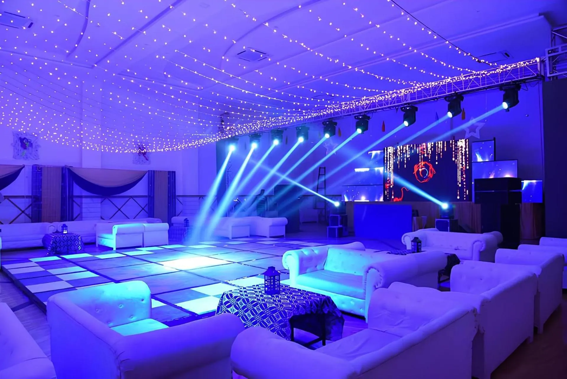 Communal lounge/ TV room in Nirmal Hotel And Resort