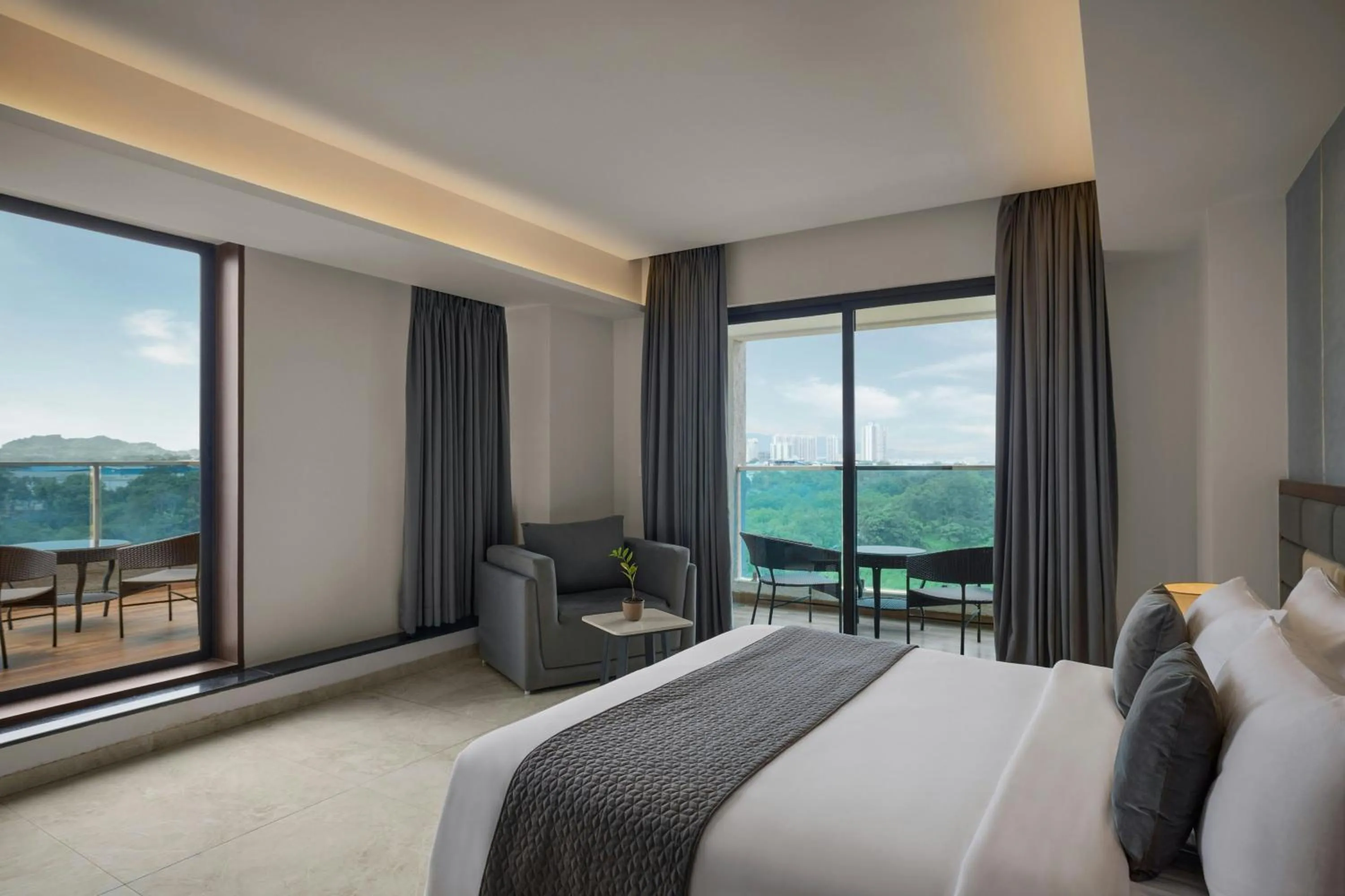 Photo of the whole room, Bed in The Fern Residency, Bhiwandi-Pimplas, Series by Marriott