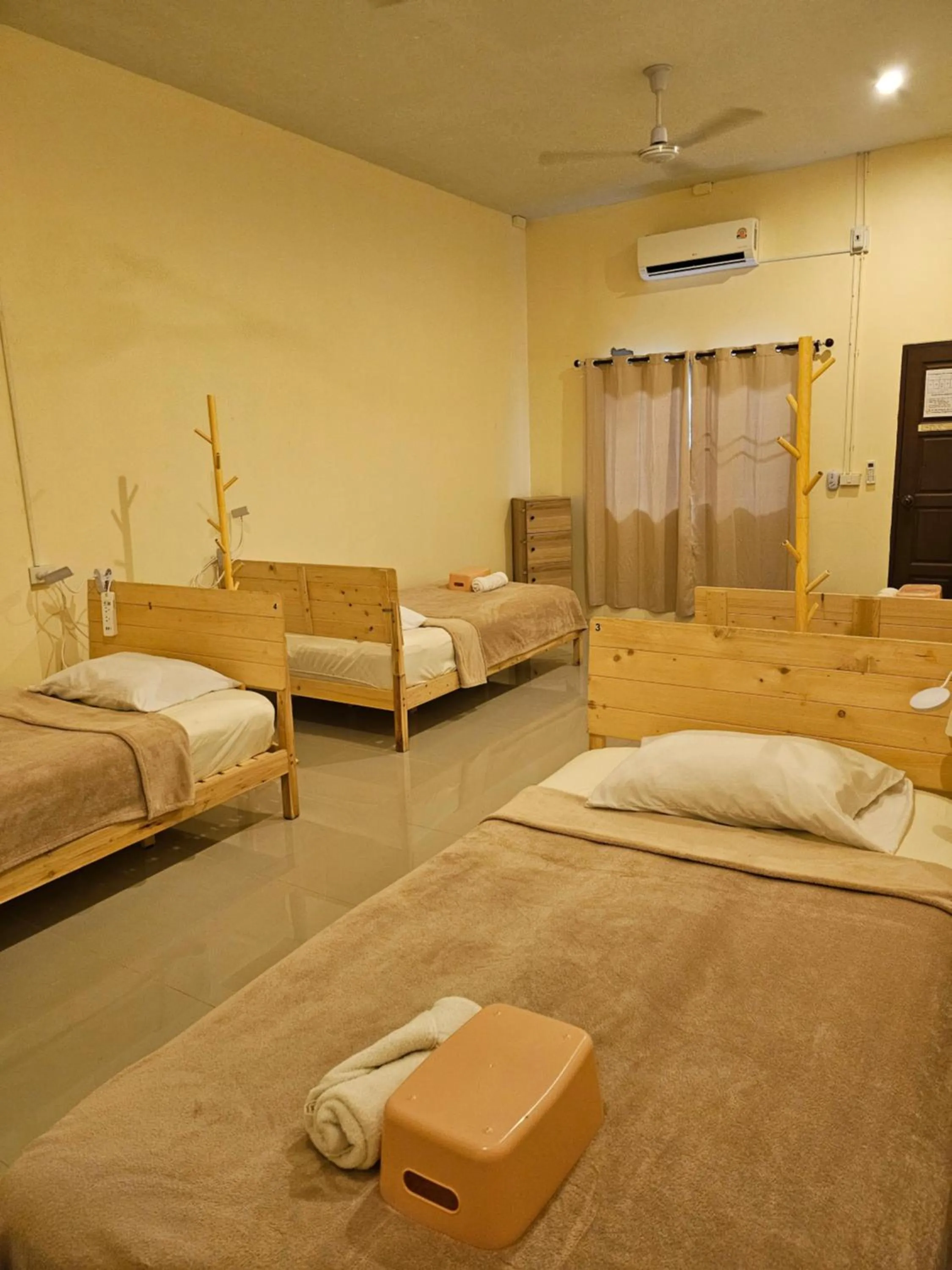 Bed in SKYPEARL Guesthouse & Café