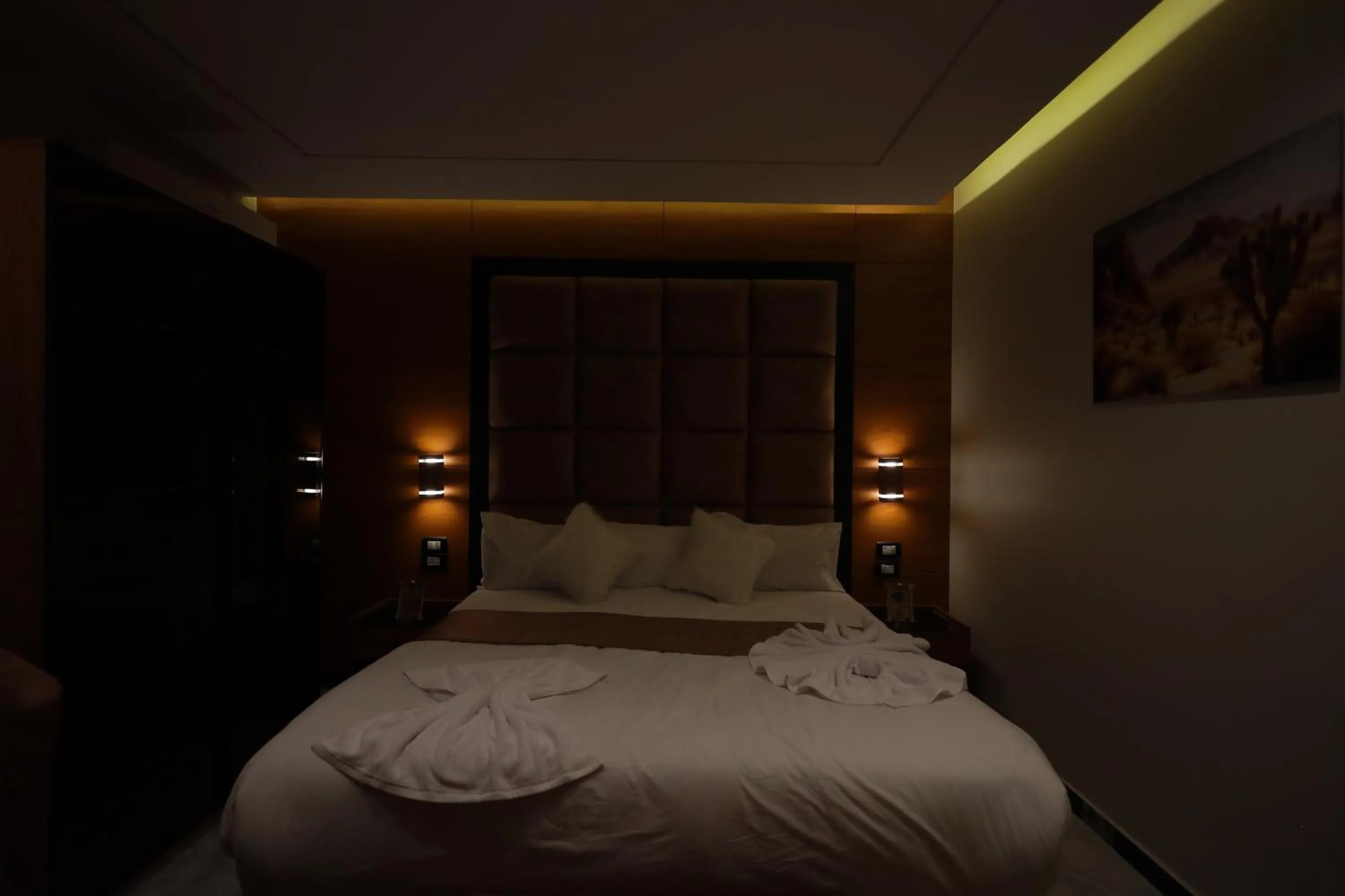 Bed in The Muse Pyramids INN