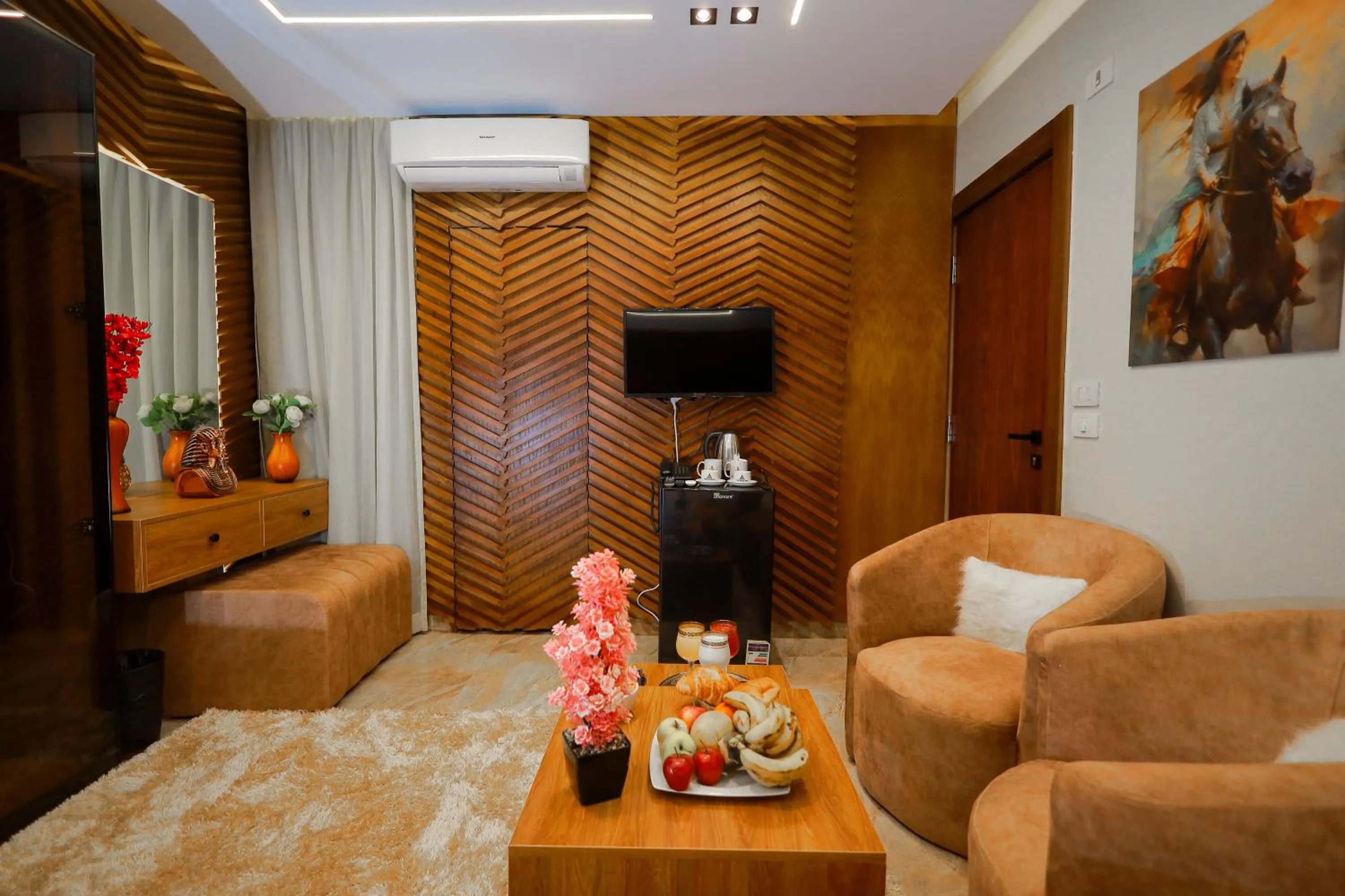 Living room in The Muse Pyramids INN