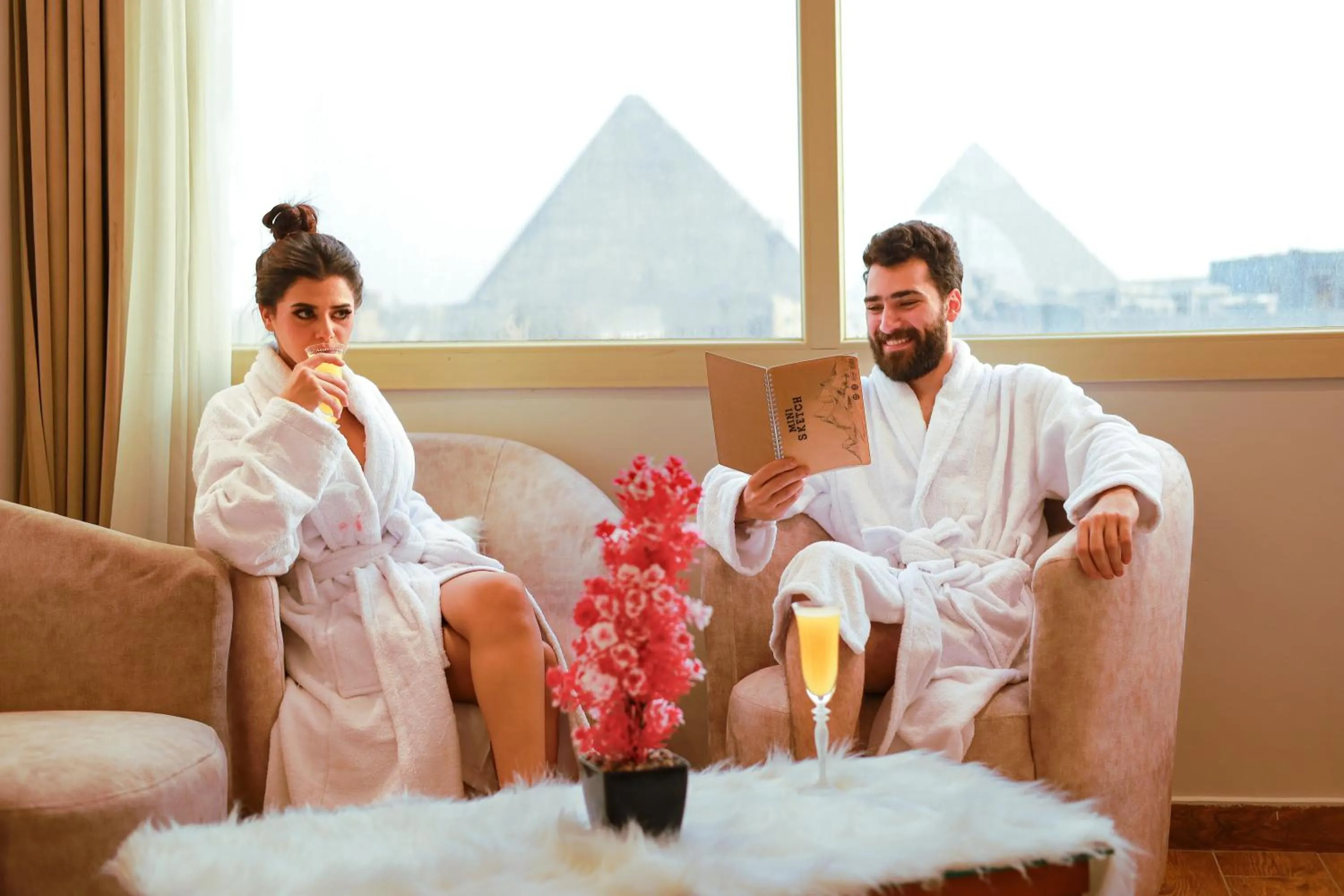 Seating area in The Muse Pyramids INN