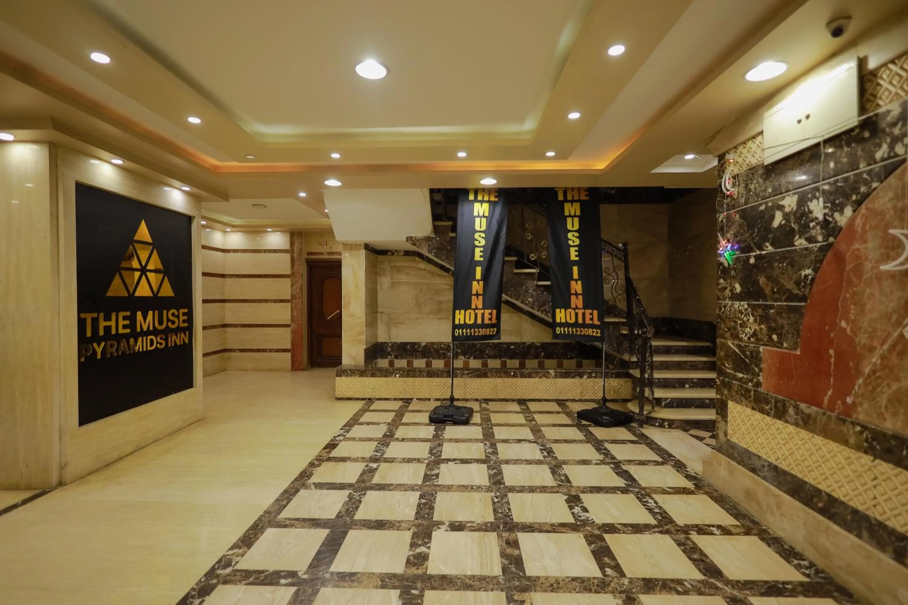 Property logo or sign in The Muse Pyramids INN