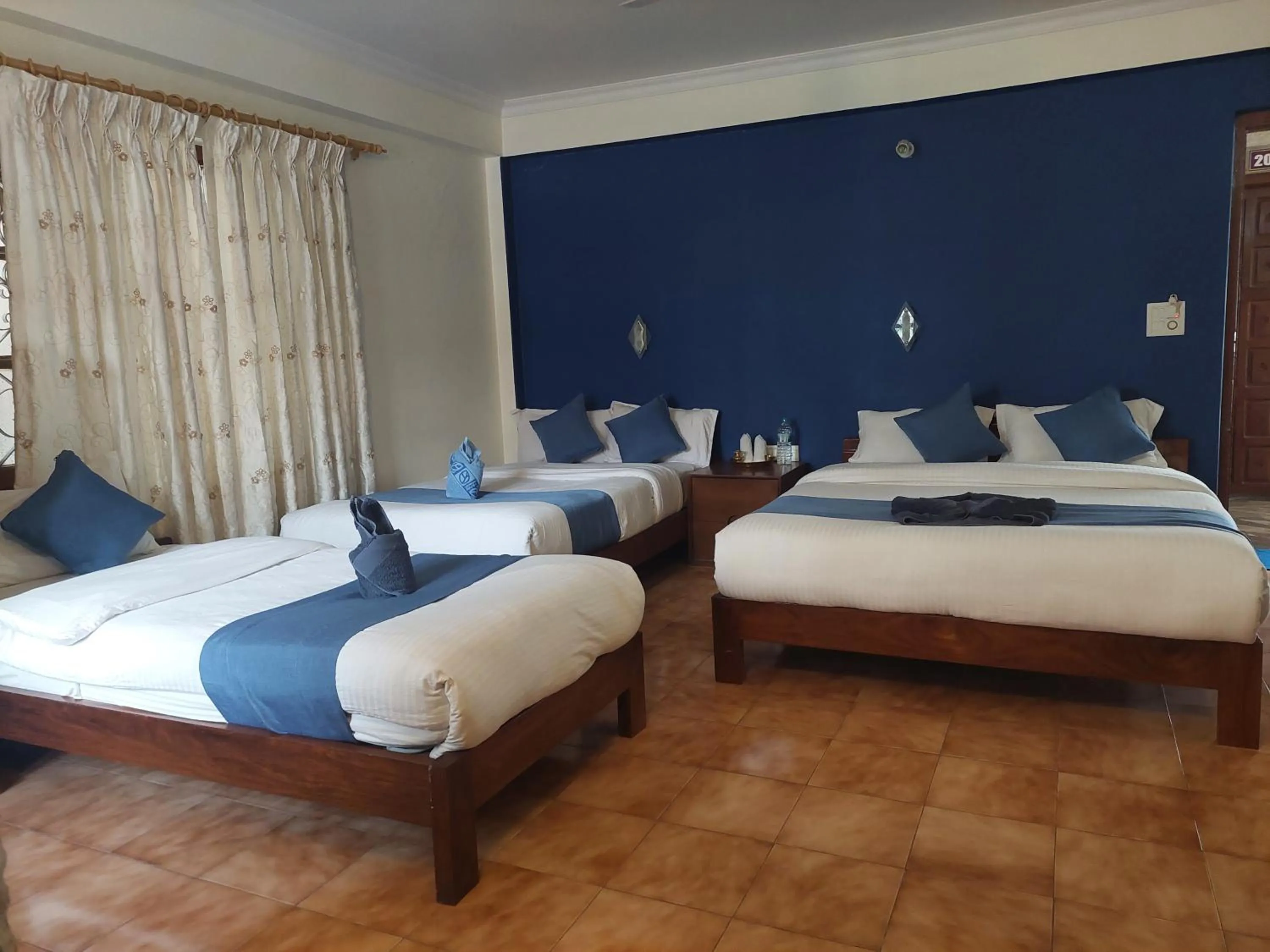 Bed in Blue Planet Lodge & Restaurant