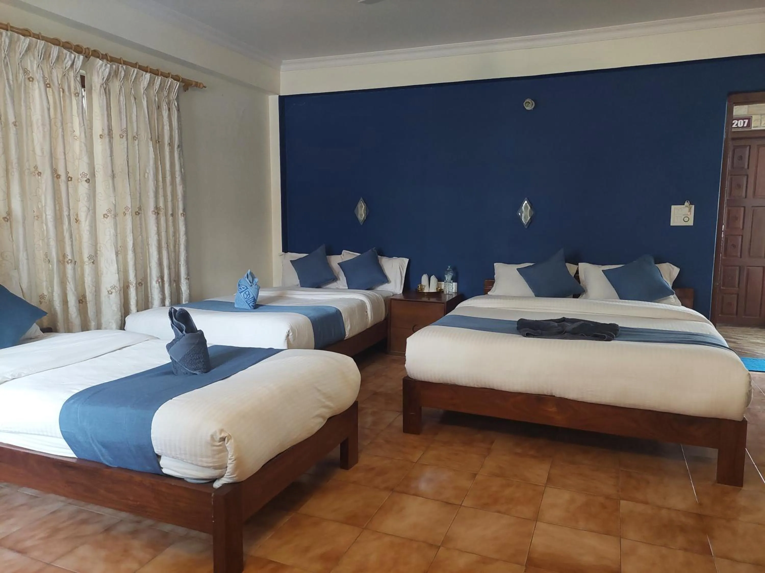 Bed in Blue Planet Lodge & Restaurant