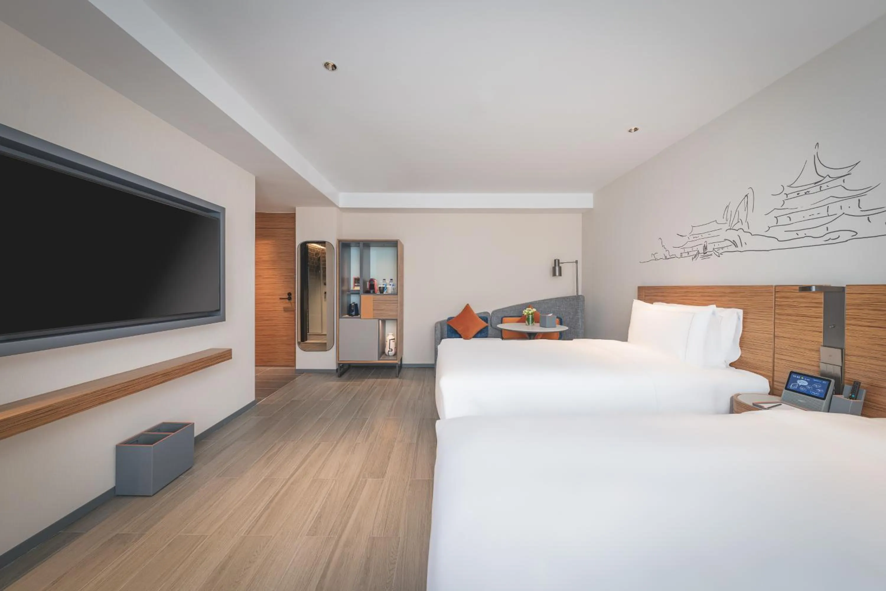 Communal lounge/ TV room in UrCove by HYATT Nanjing Downtown