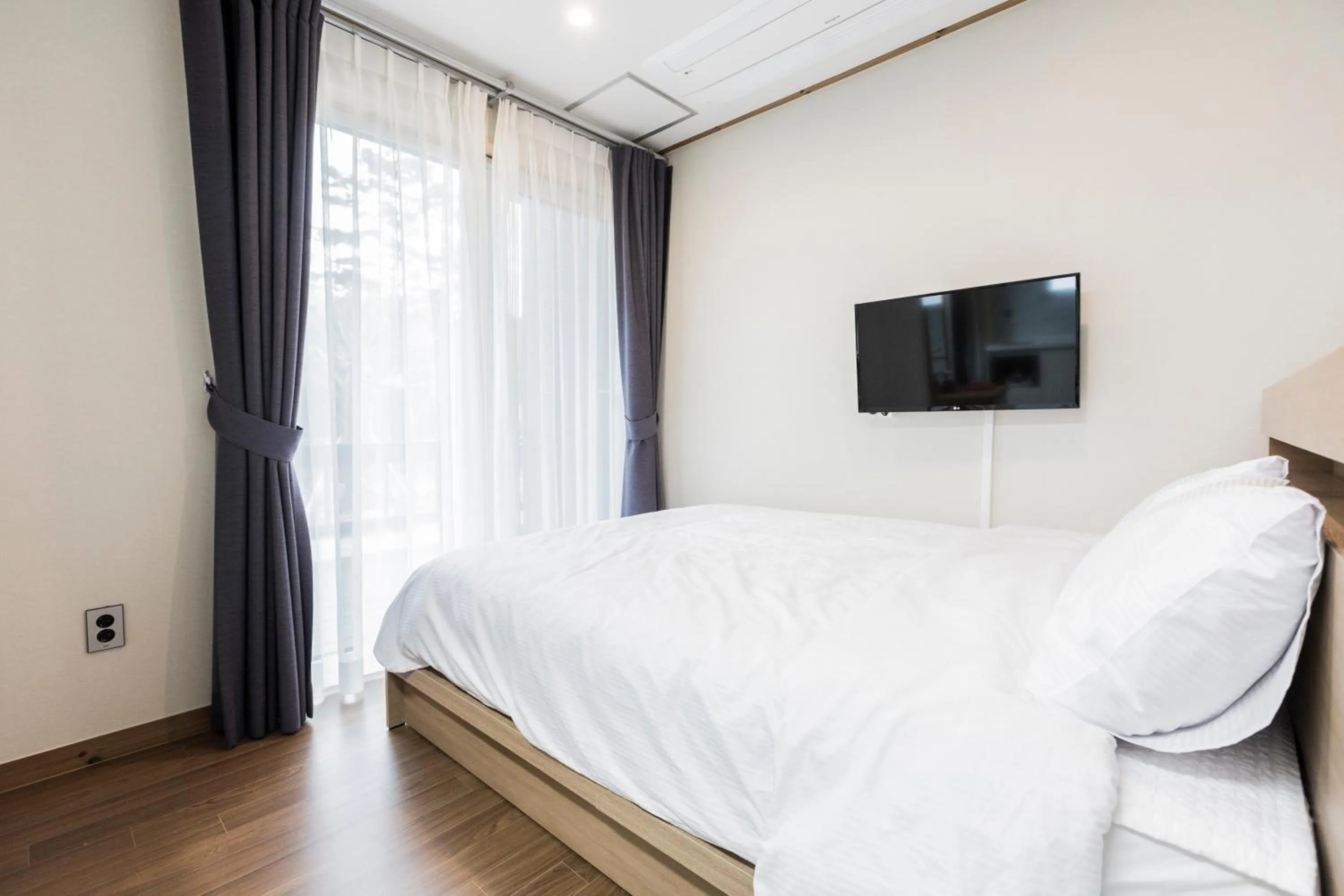 Bed in Jeju batdol guesthouse