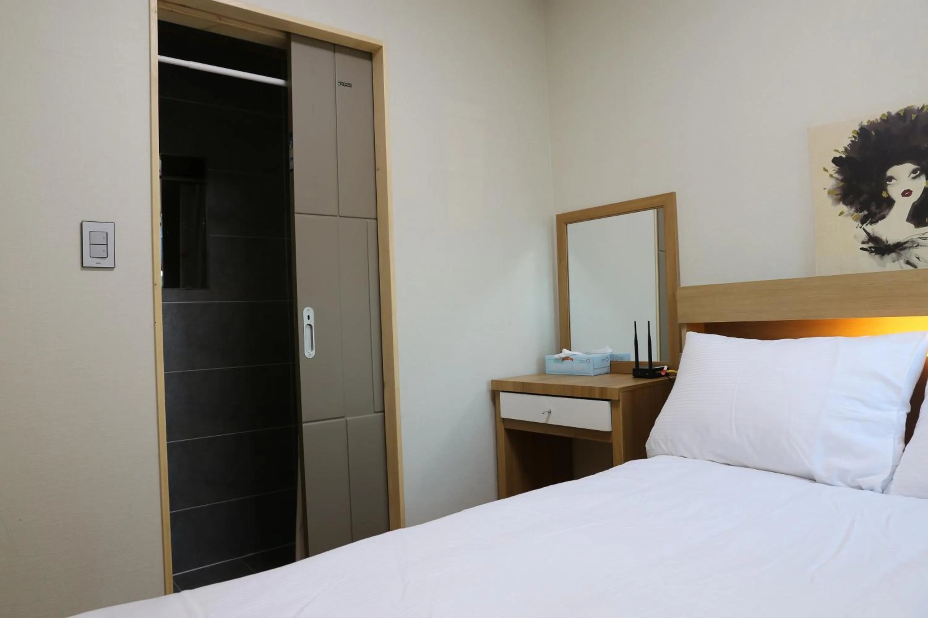 Bed in Jeju batdol guesthouse