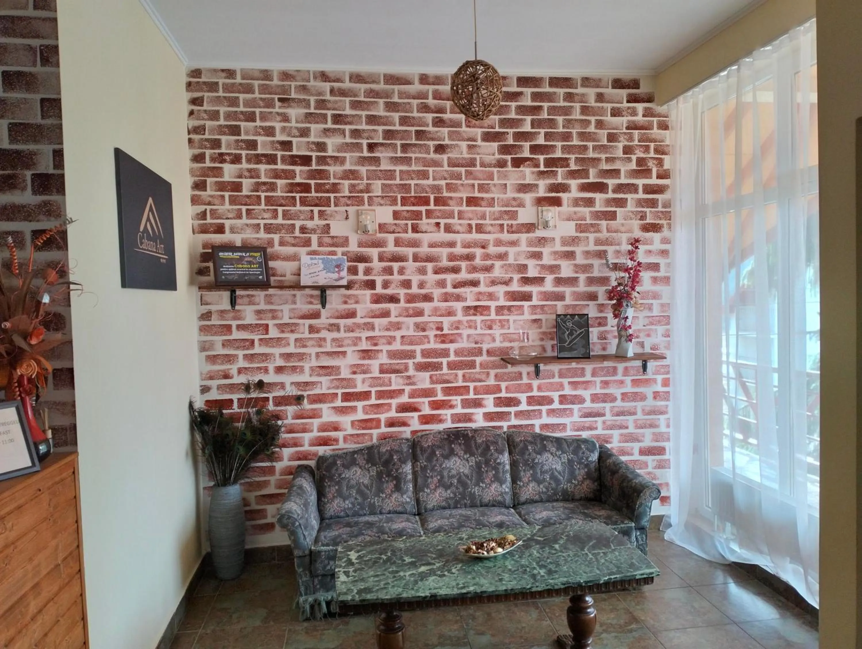 Lobby or reception in Pensiunea Cabana Art