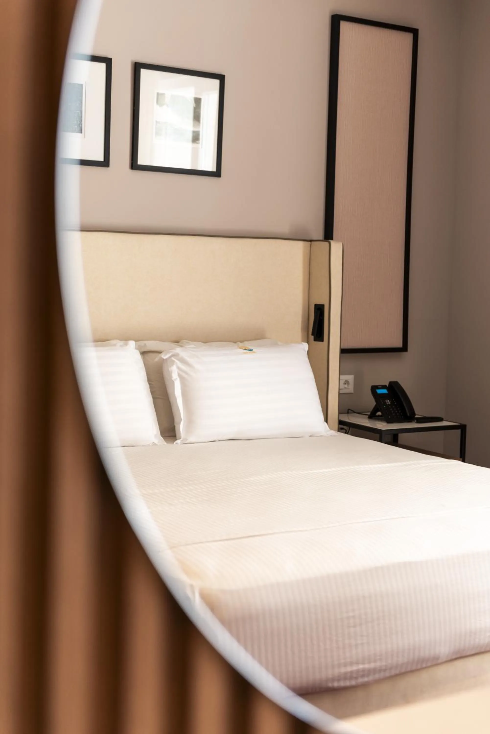 Bed in Hotel Amelia Mare