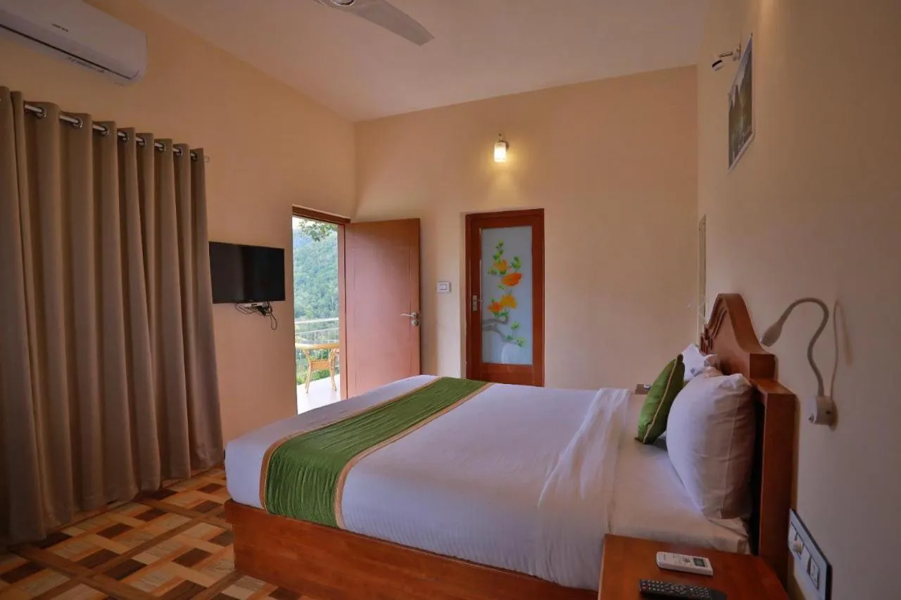 Bed in Ayurgem Ayurveda Yoga and Wellness Retreat Munnar