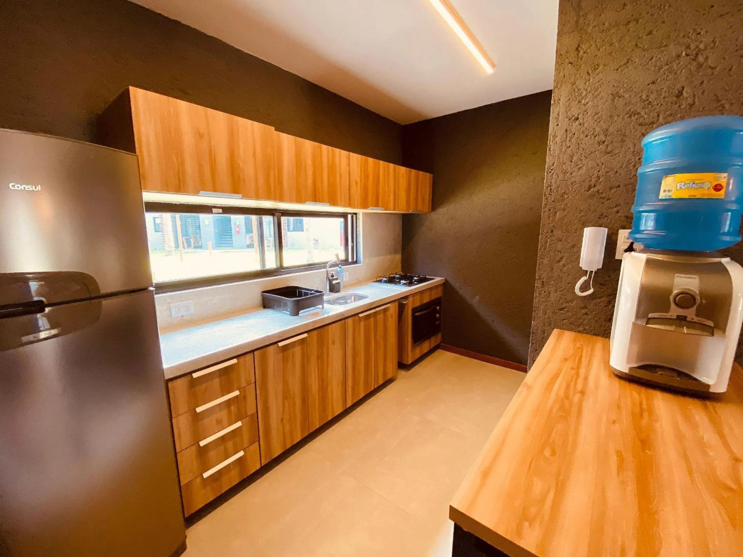 Kitchen or kitchenette in Villas Manatee Milagres por Quarto à Vista