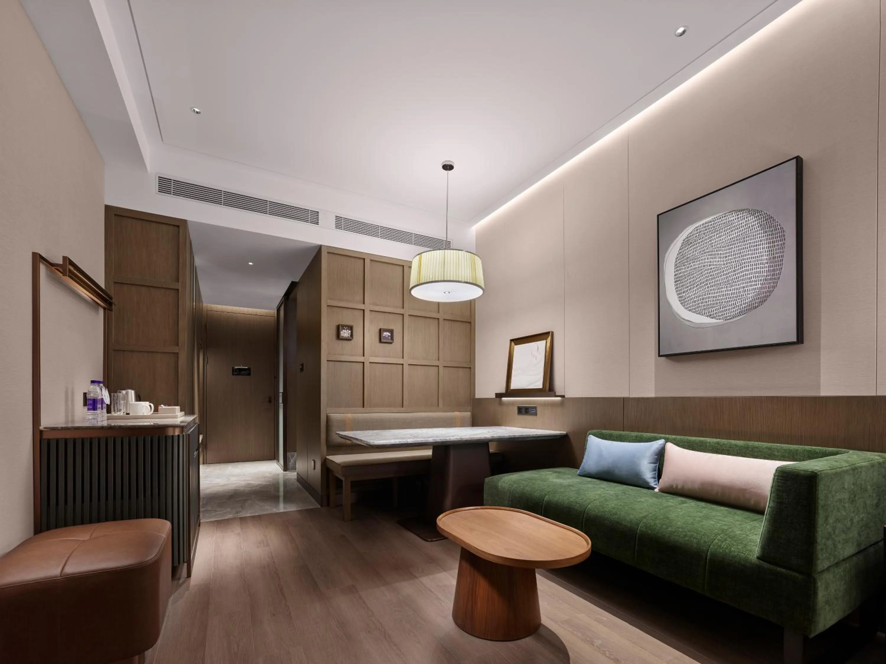 Seating area, Bed in Doubletree By Hilton Yantai Golden Coast Hotel & Suites