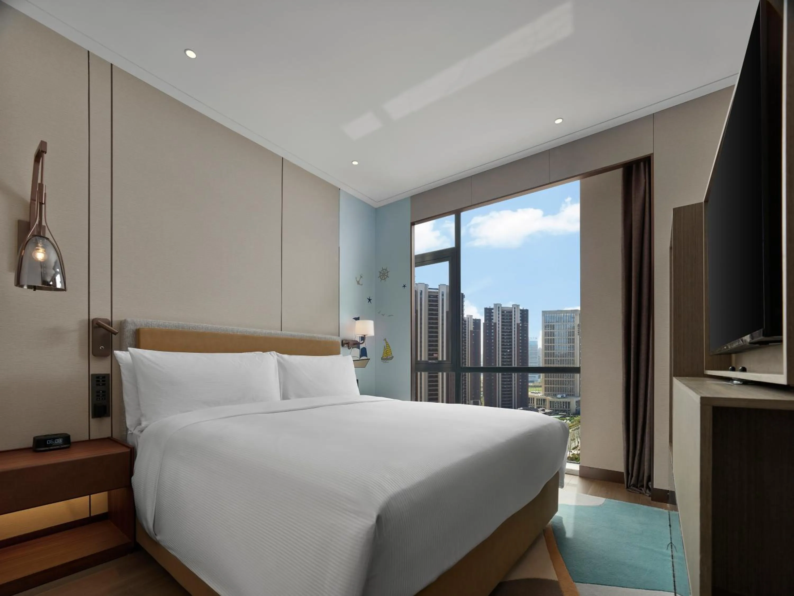 Property building, Bed in Doubletree By Hilton Yantai Golden Coast Hotel & Suites