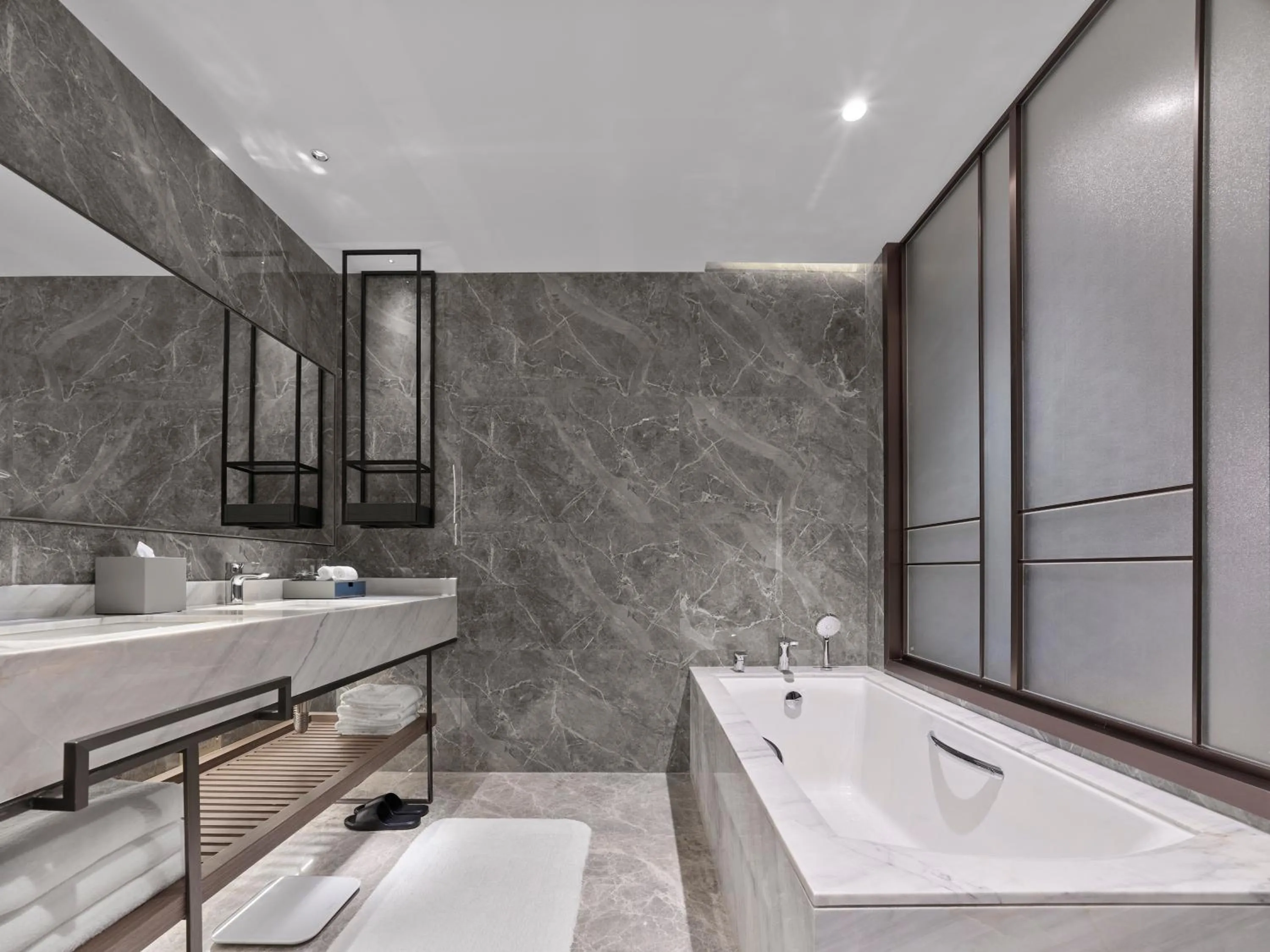 Bathroom in Doubletree By Hilton Yantai Golden Coast Hotel & Suites