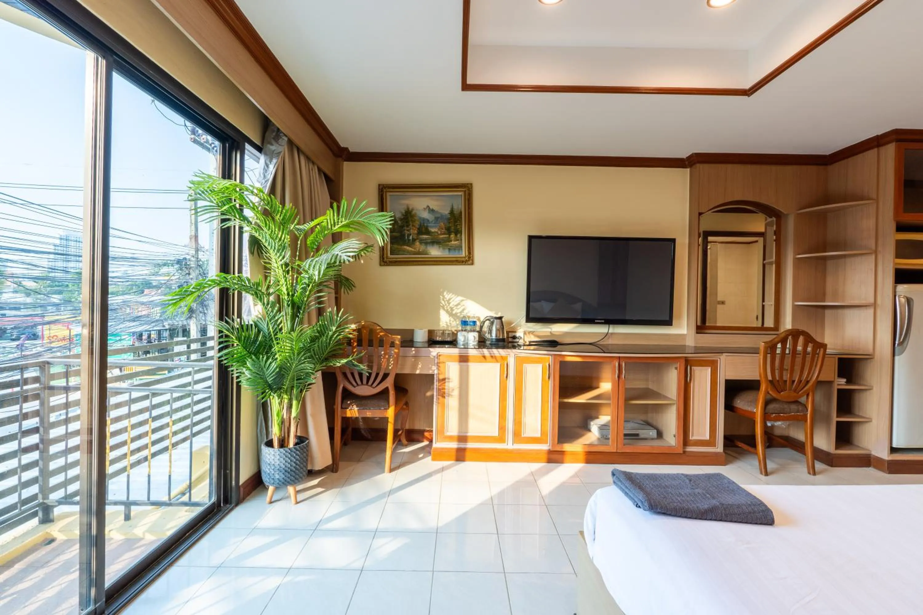 Bed in La Casa South Pattaya Hotel