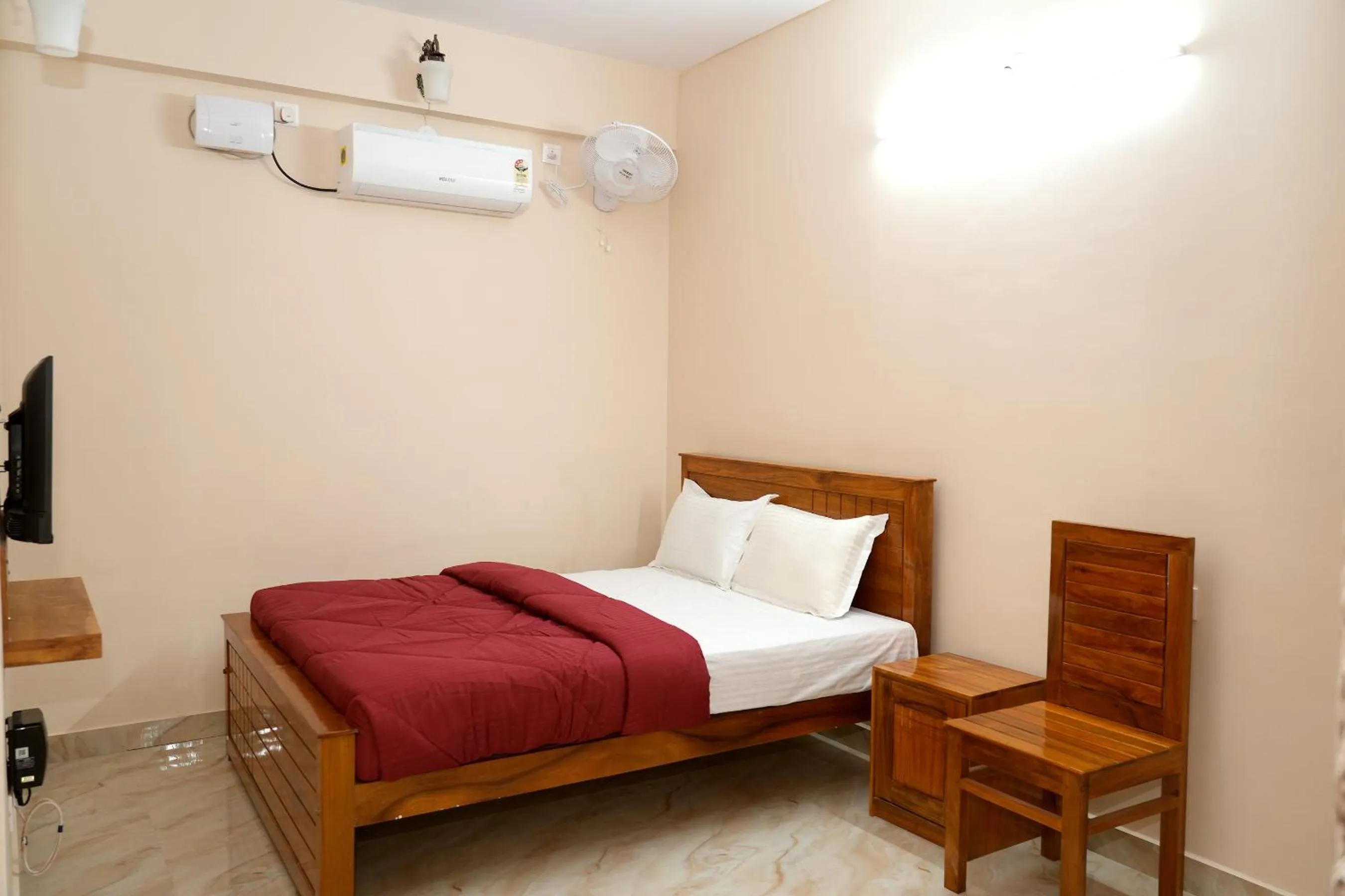 Bed in HILL PALACE RESIDENCY COORG