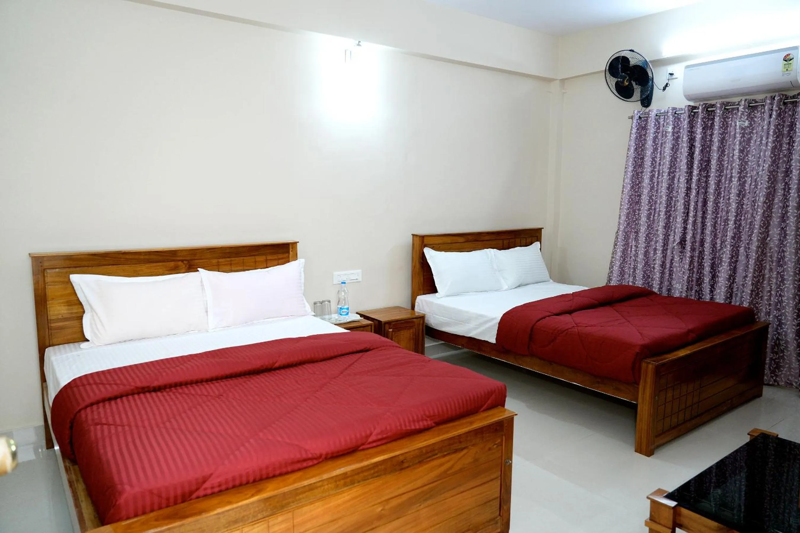 Bed in HILL PALACE RESIDENCY COORG