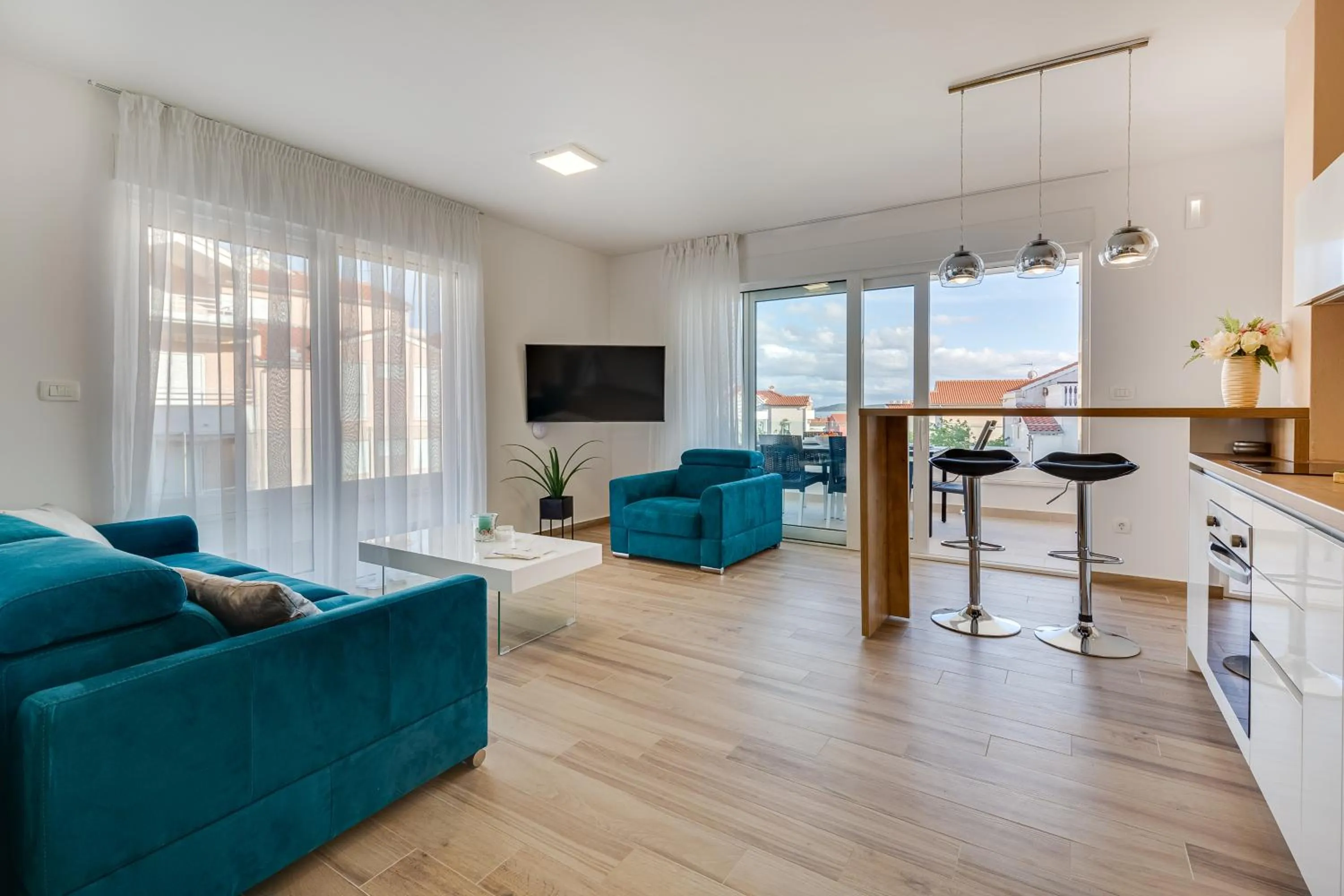 TV and multimedia in Villa Corcovado Deluxe Apartments with Heated Pool