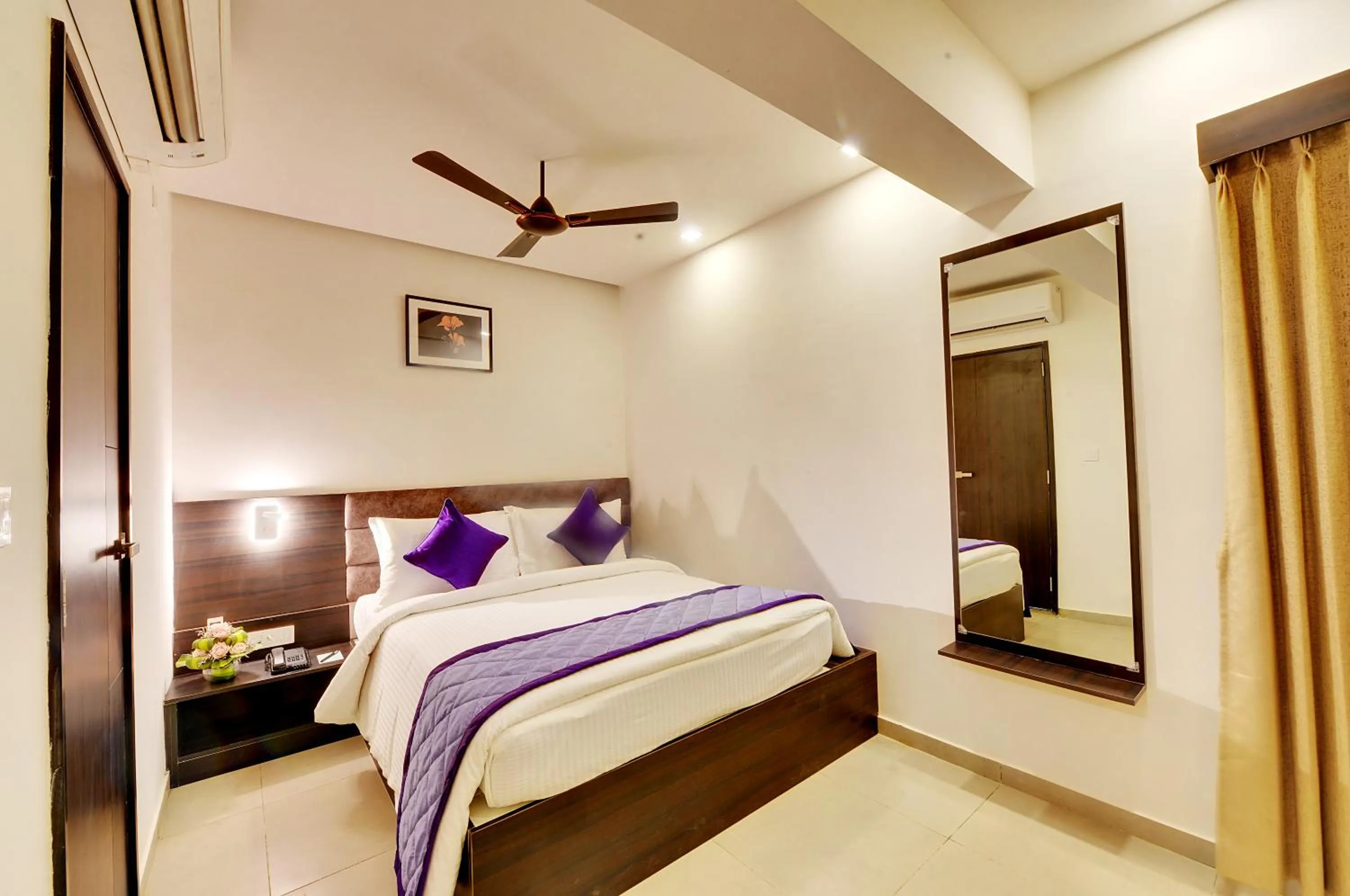 Bed in The Lavender Hotel