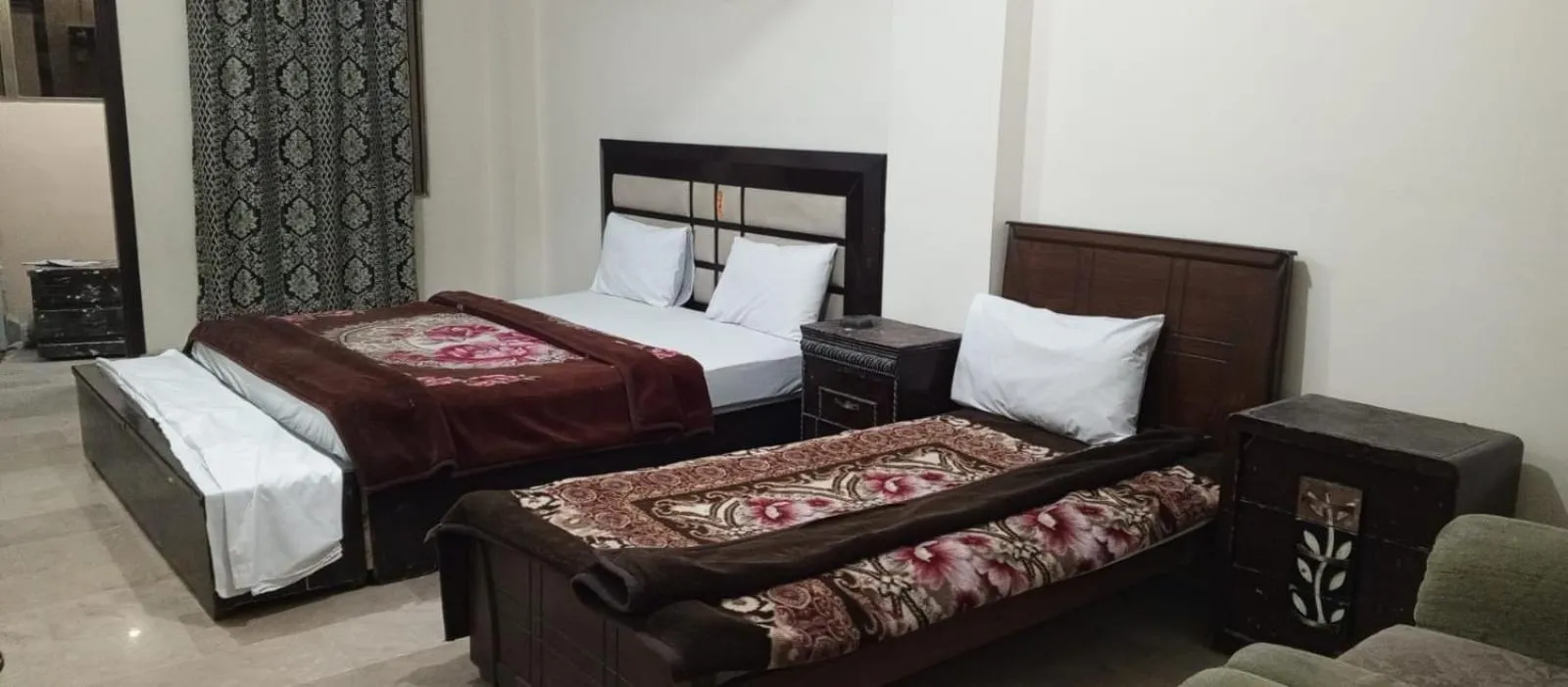Bed in Hotel Abbasi Palace