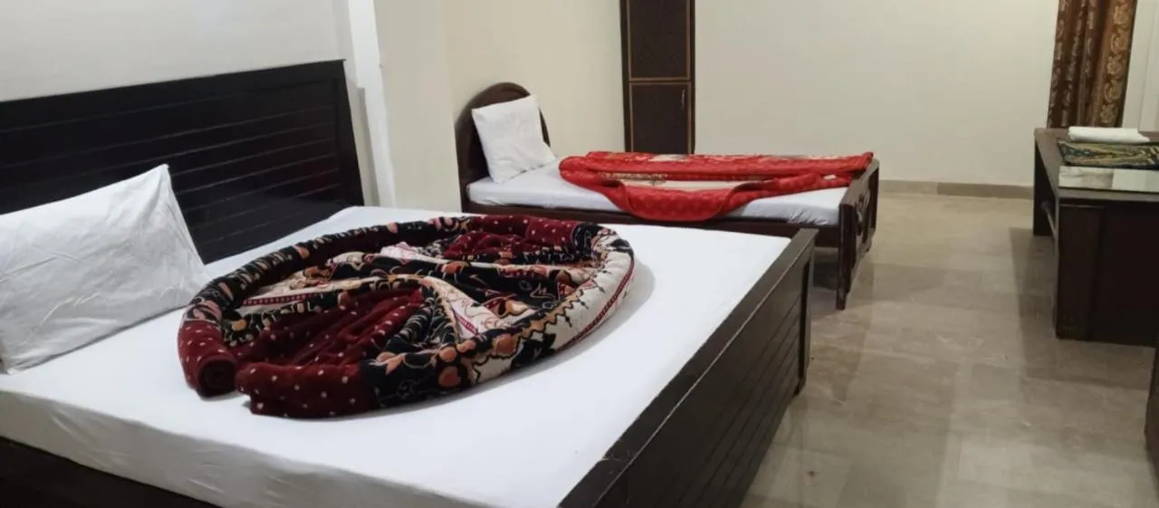Bed in Hotel Abbasi Palace