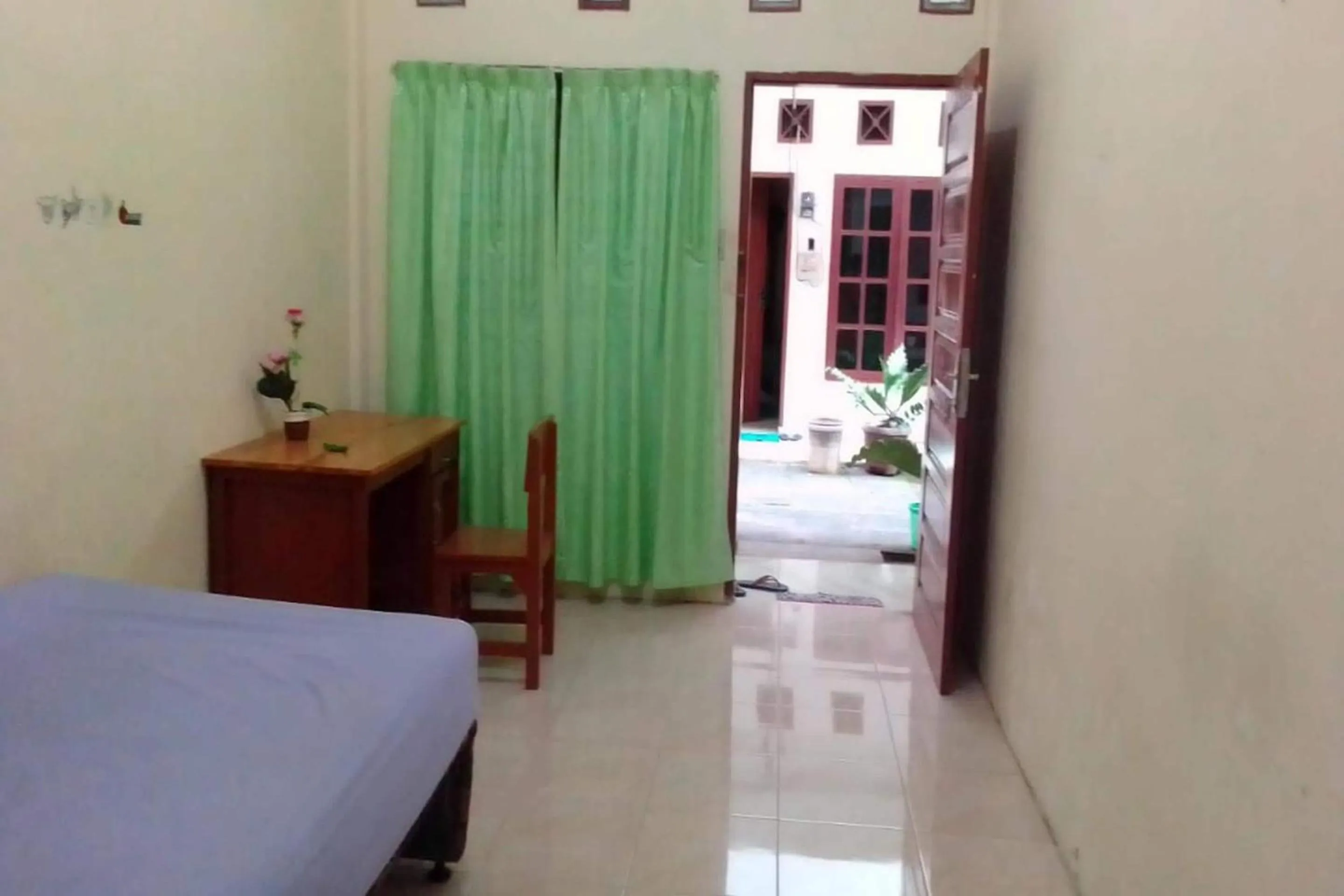 Bedroom, Bed in Hotel O Fermansio Homestay 1