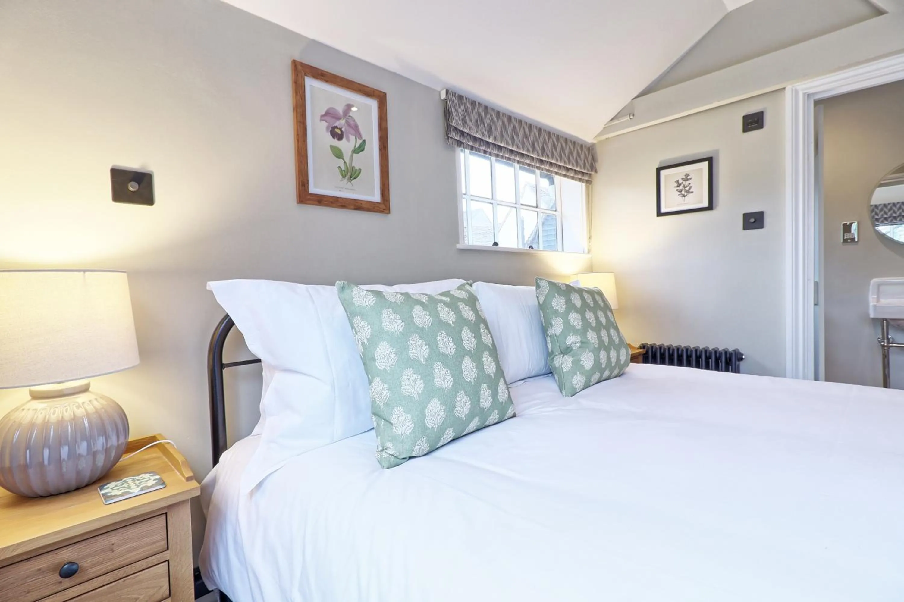 Bed in Ranfield's Brasserie Hotel Rooms