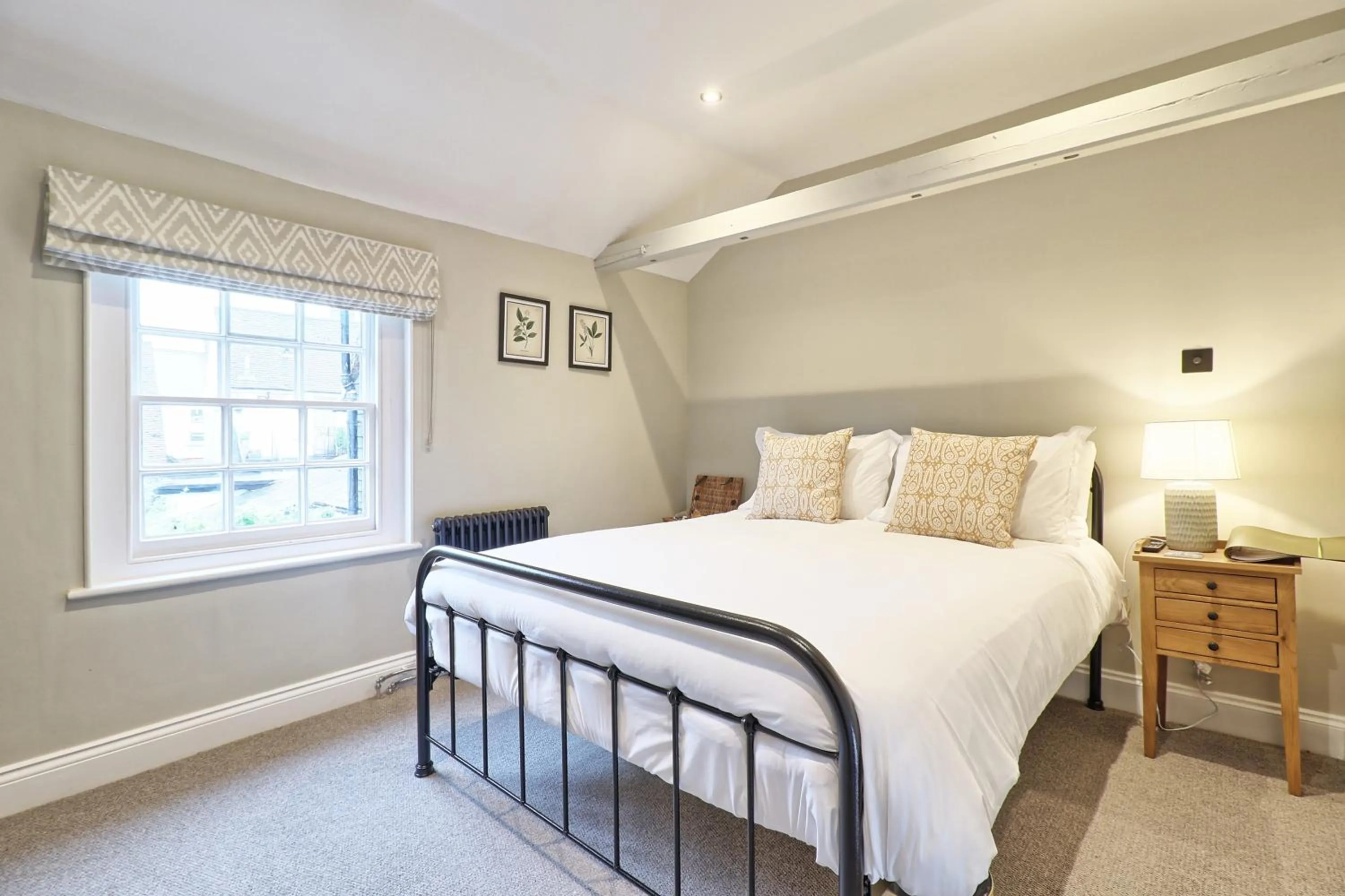 Bed in Ranfield's Brasserie Hotel Rooms