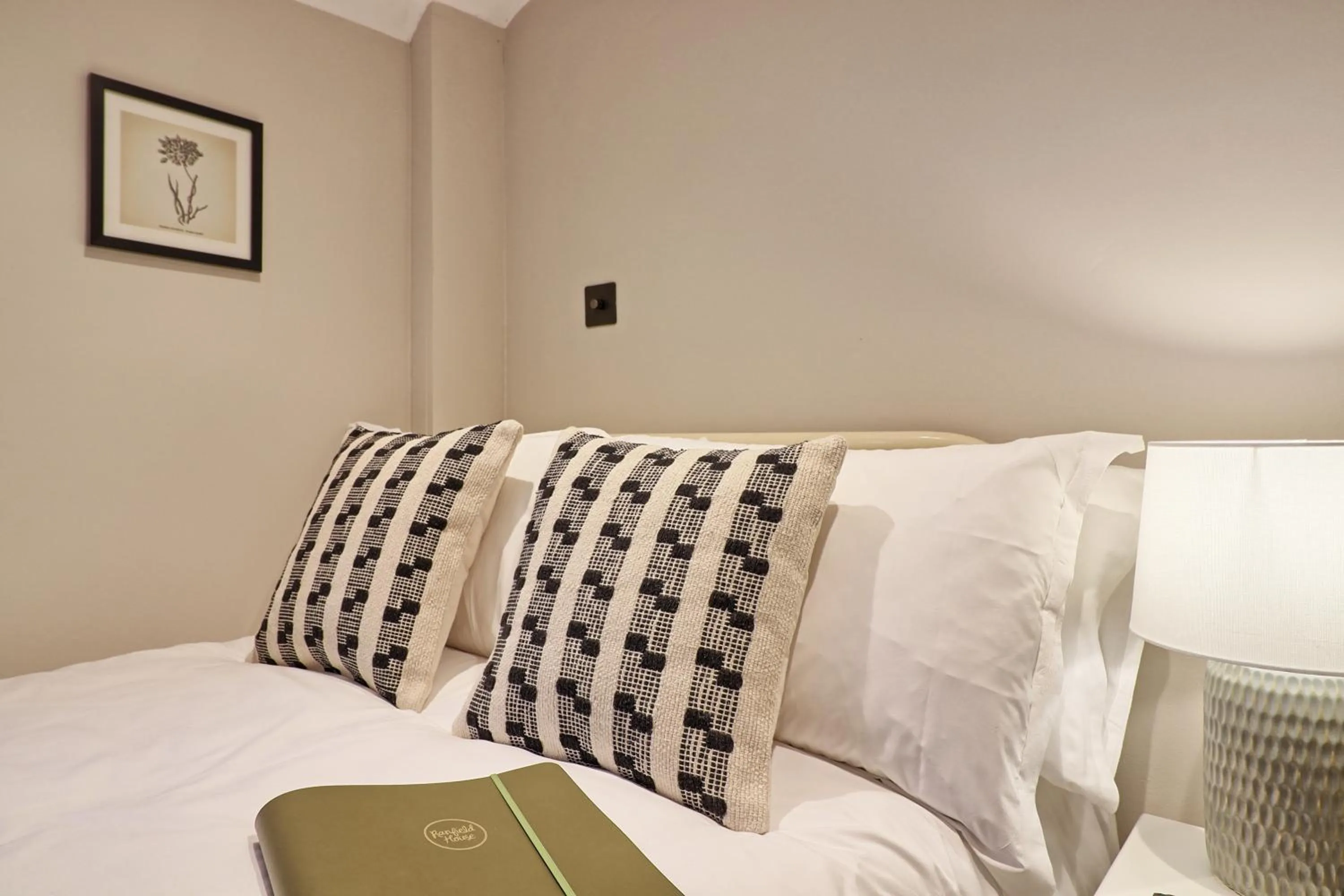 Bed in Ranfield's Brasserie Hotel Rooms