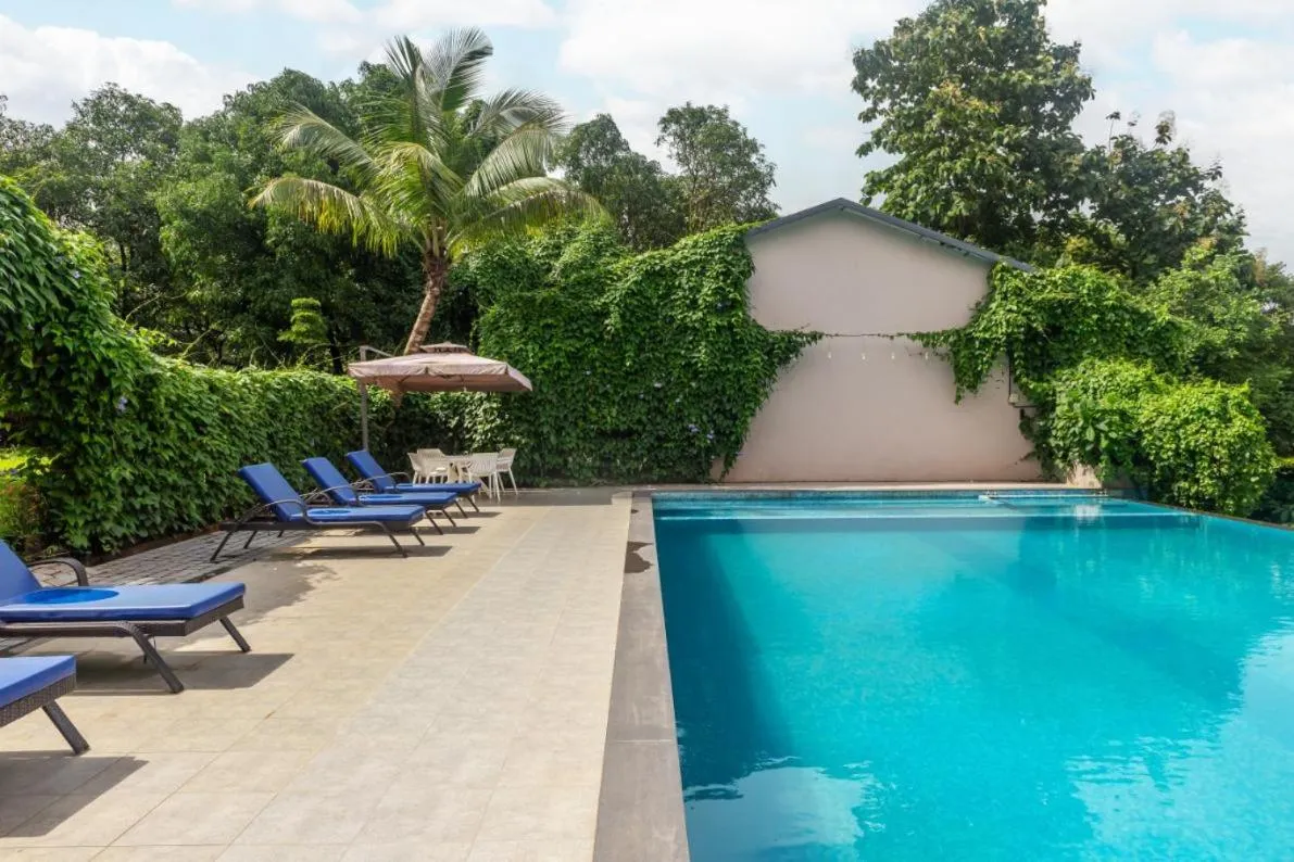 Swimming pool in River Estates Resort, Restaurant & Spa by Vibescapes