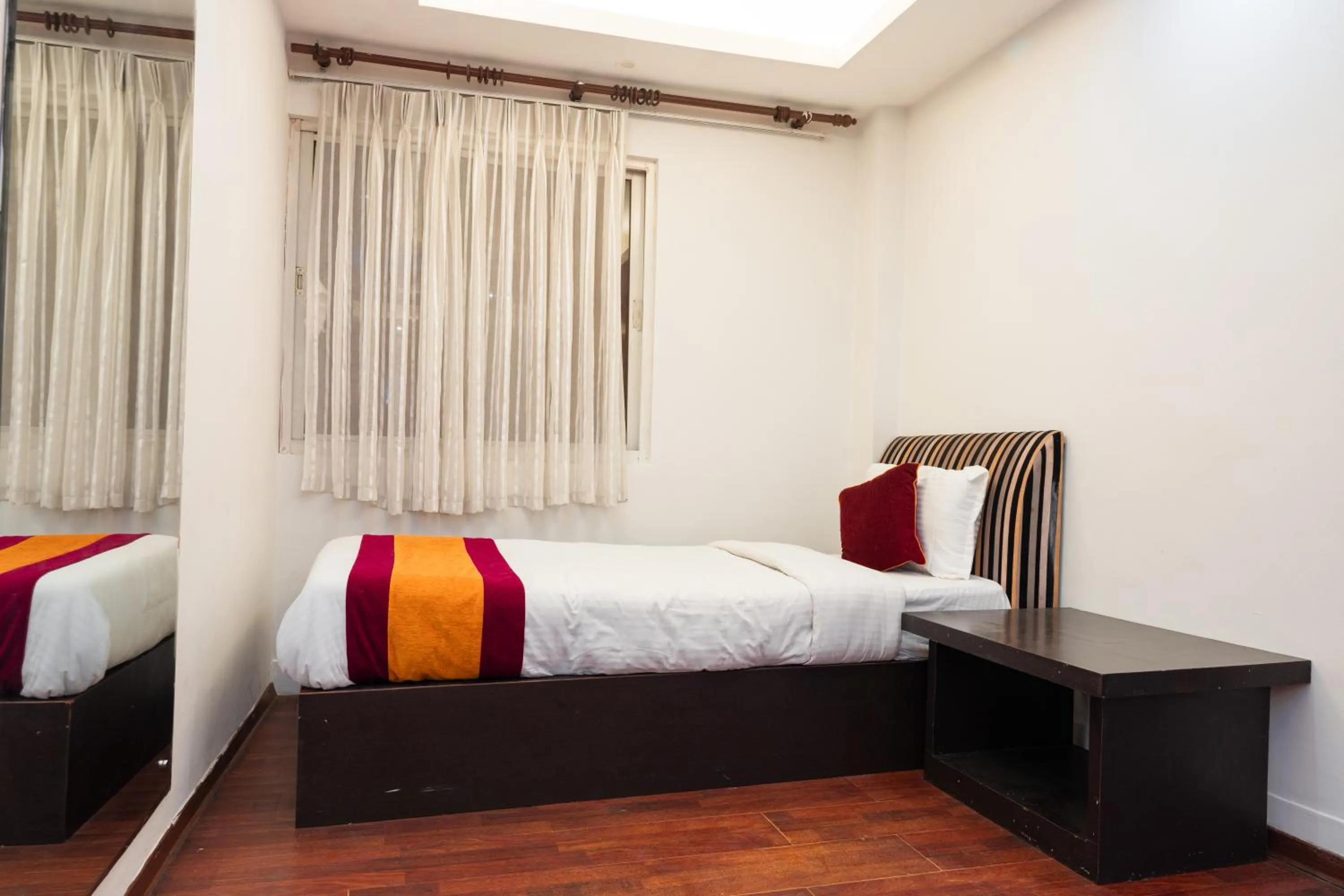 Bed in Hotel Kathmandu square