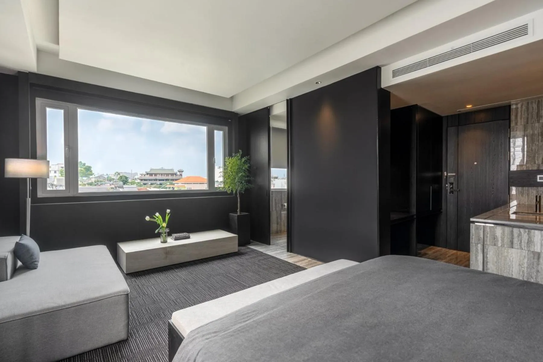 Photo of the whole room, Bed in M Village Nguyễn Kiệm - Cosmo Airport Hotel