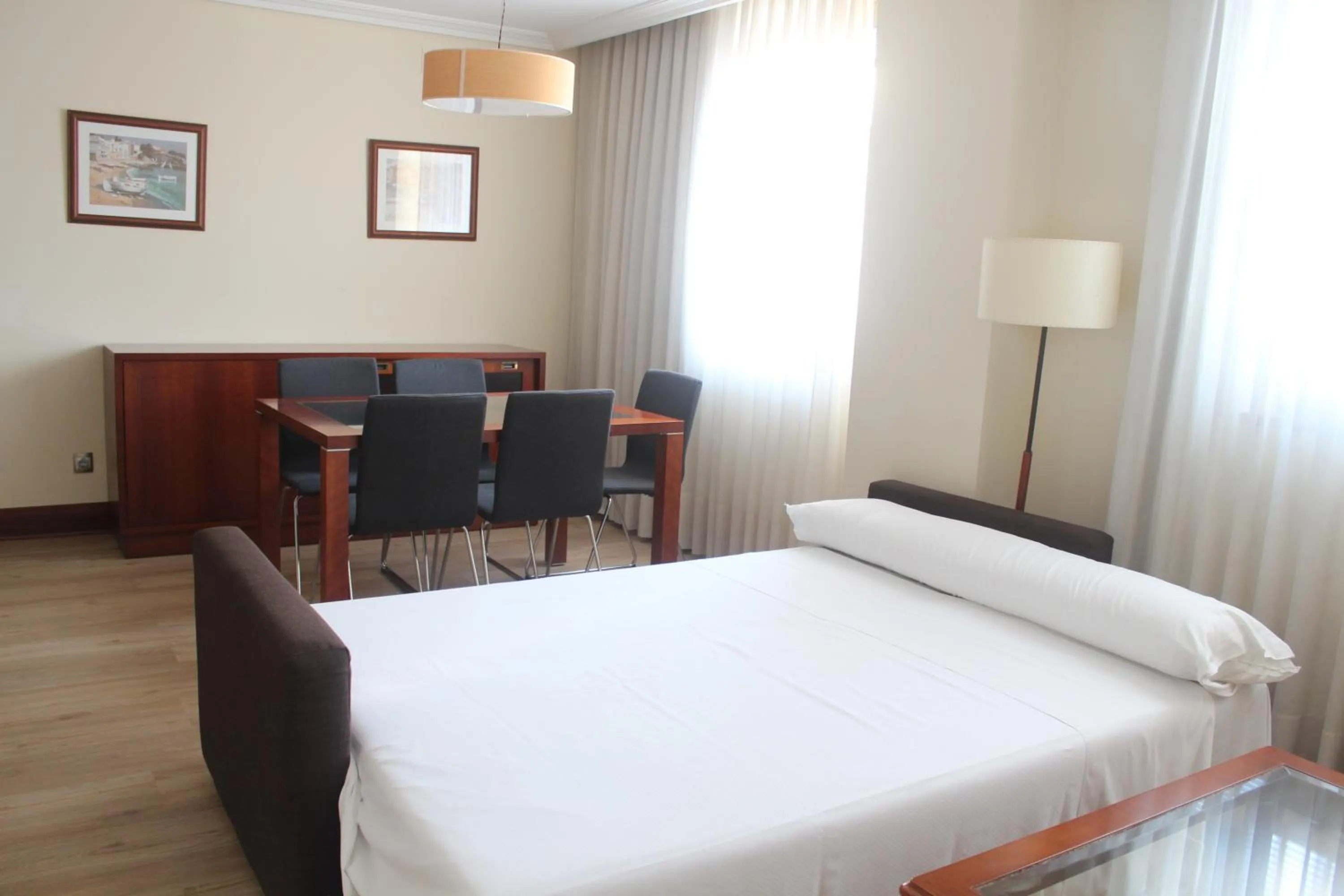 Living room, Bed in Santiago Apartments Bilbao