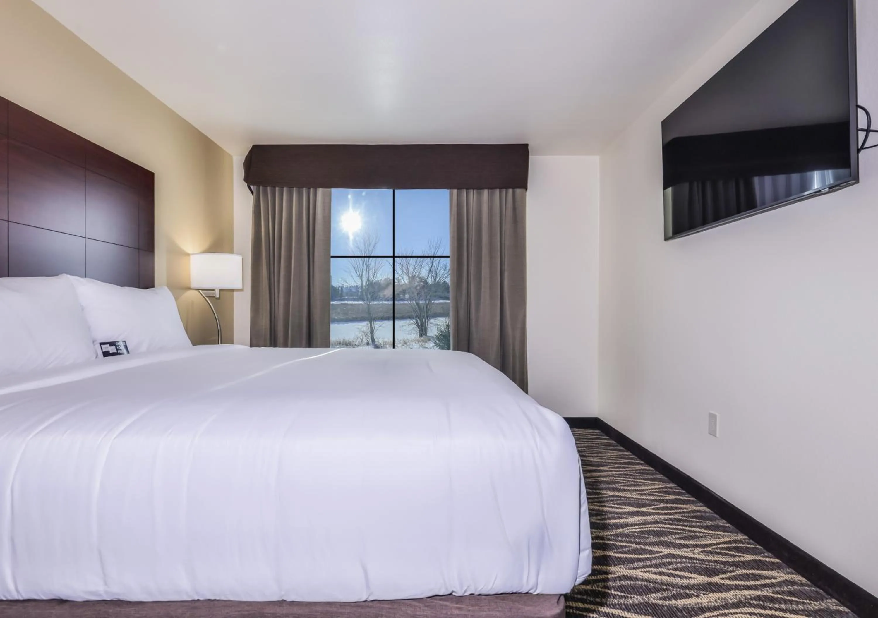 Bed in Cobblestone Hotel & Suites - Rhinelander
