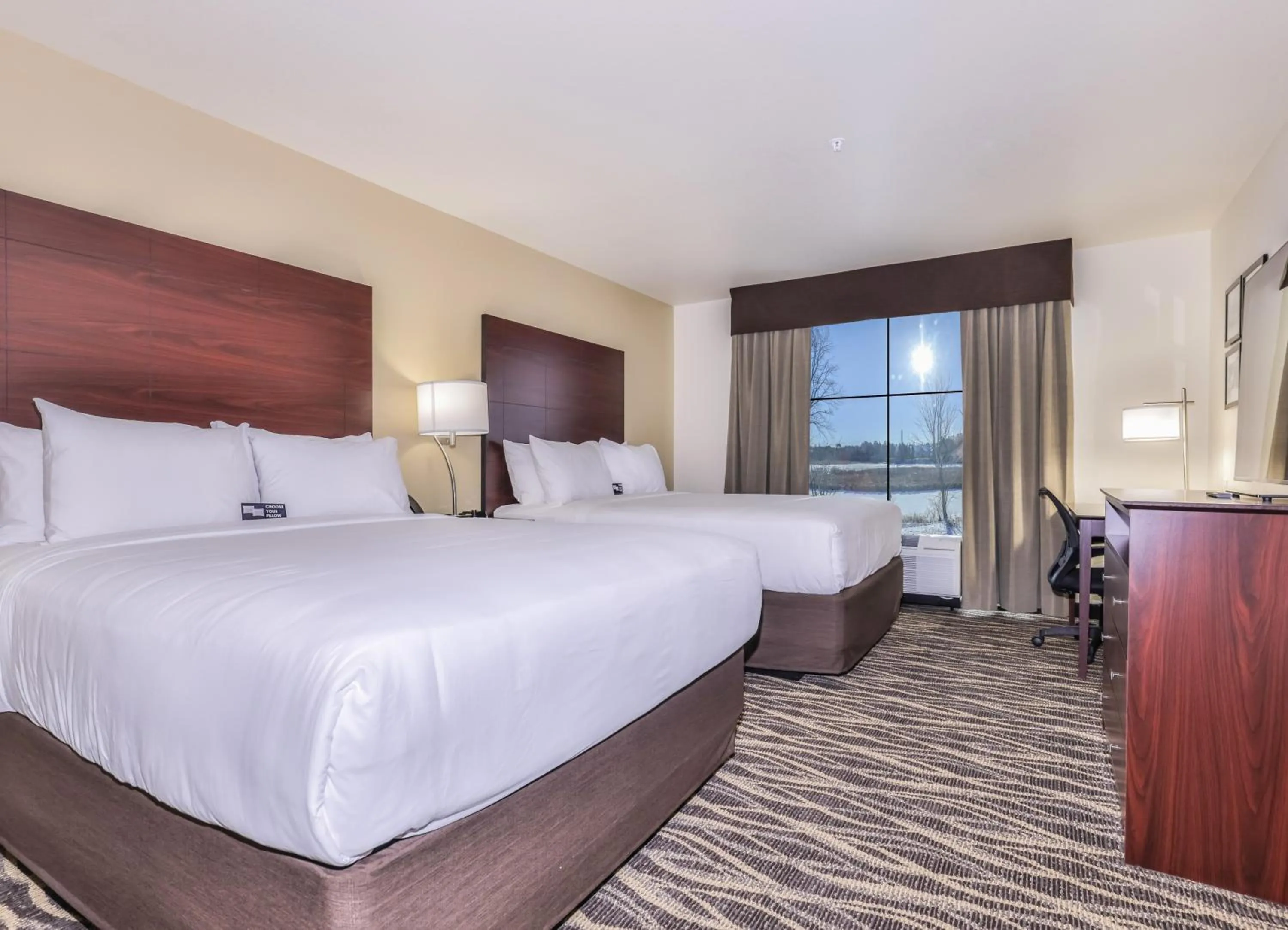 Bed in Cobblestone Hotel & Suites - Rhinelander