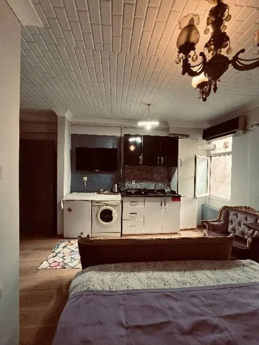 Kitchen or kitchenette in KANARYA SUİT OTELL