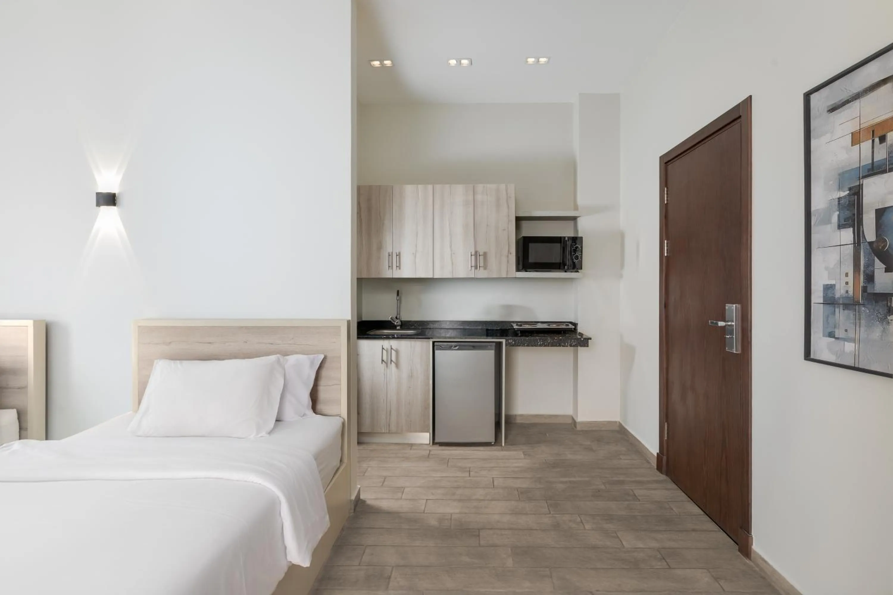 Bed in Sleep Inn Apart-Hotel