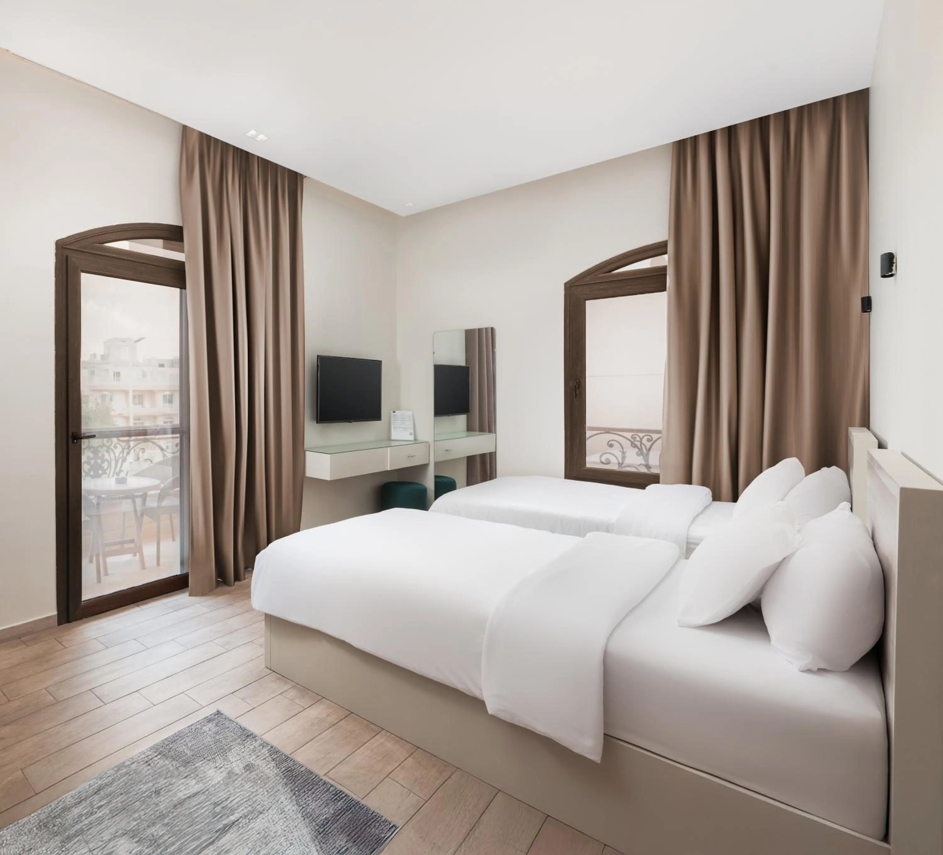 Bed in Sleep Inn Apart-Hotel