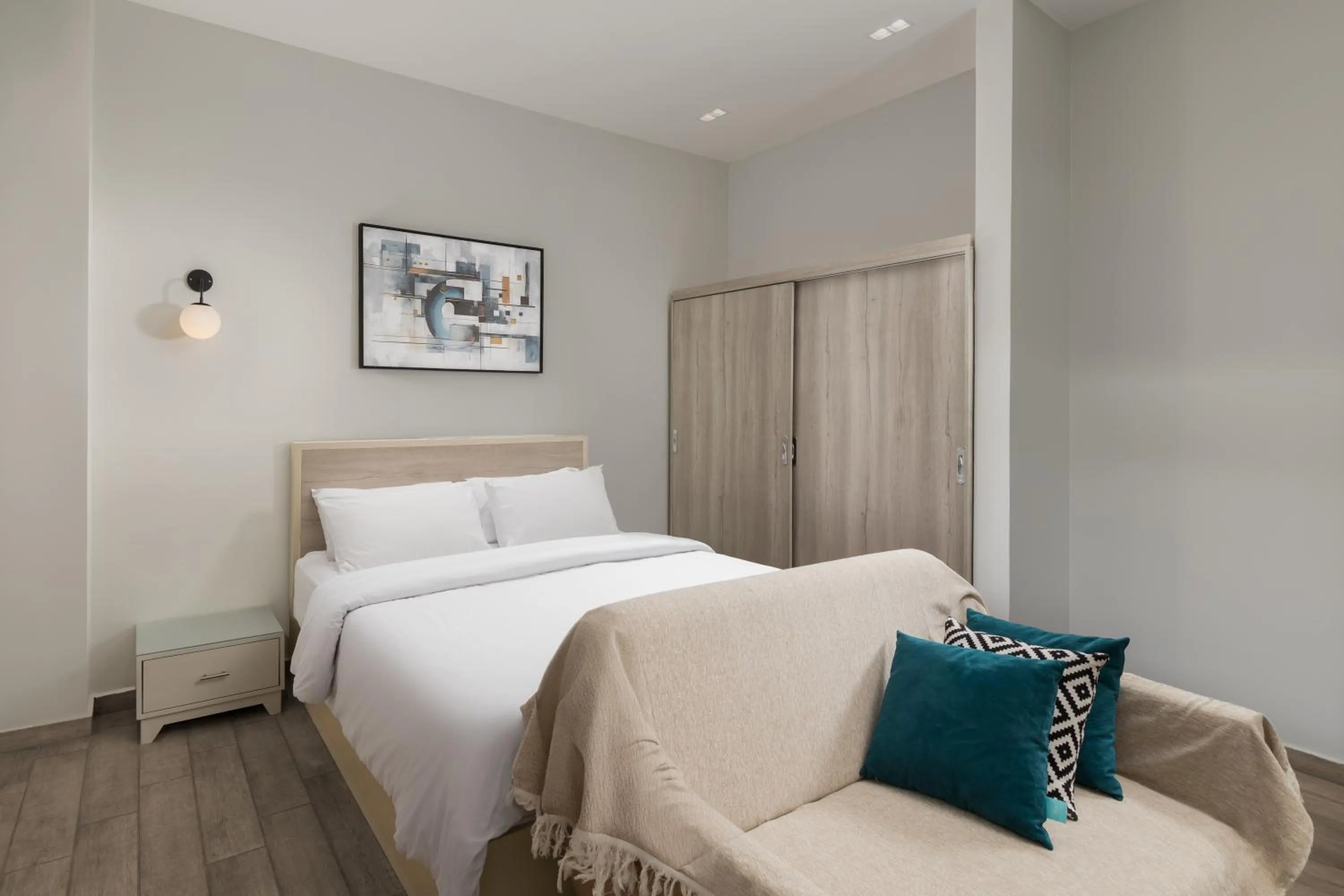 Bed in Sleep Inn Apart-Hotel