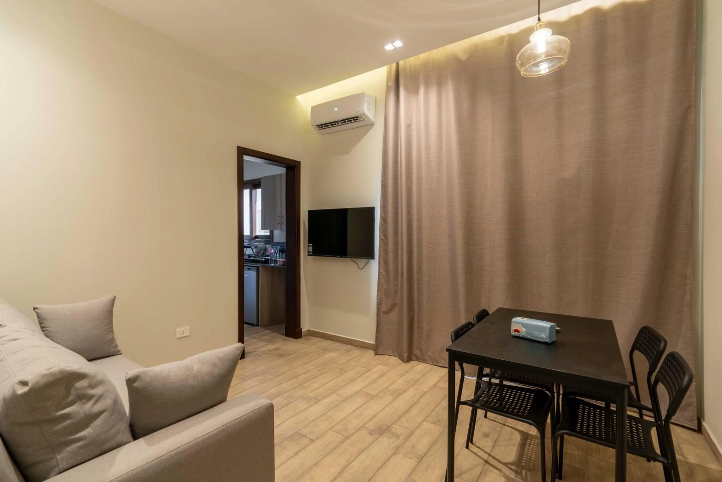 TV and multimedia in Sleep Inn Apart-Hotel