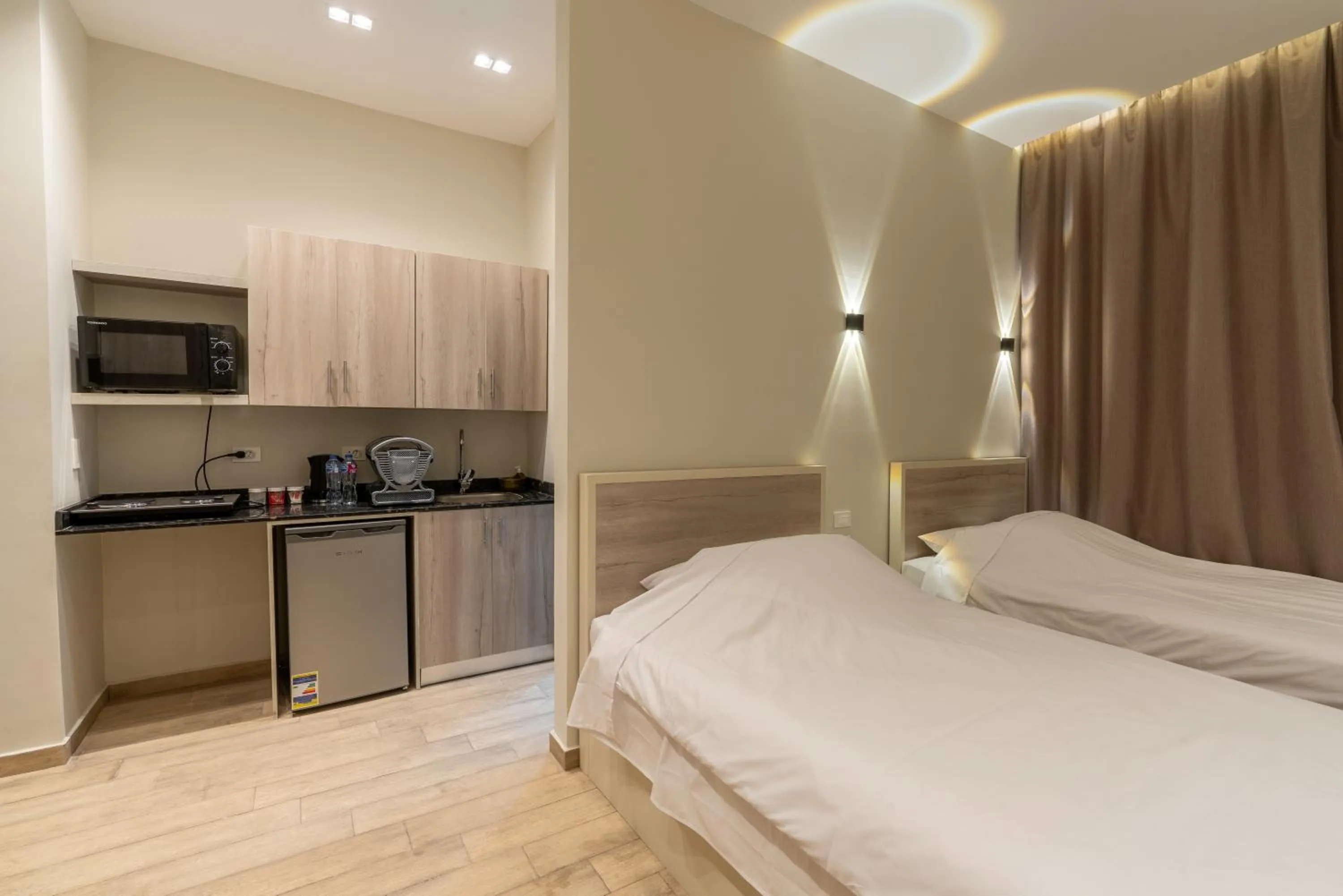 Bed in Sleep Inn Apart-Hotel