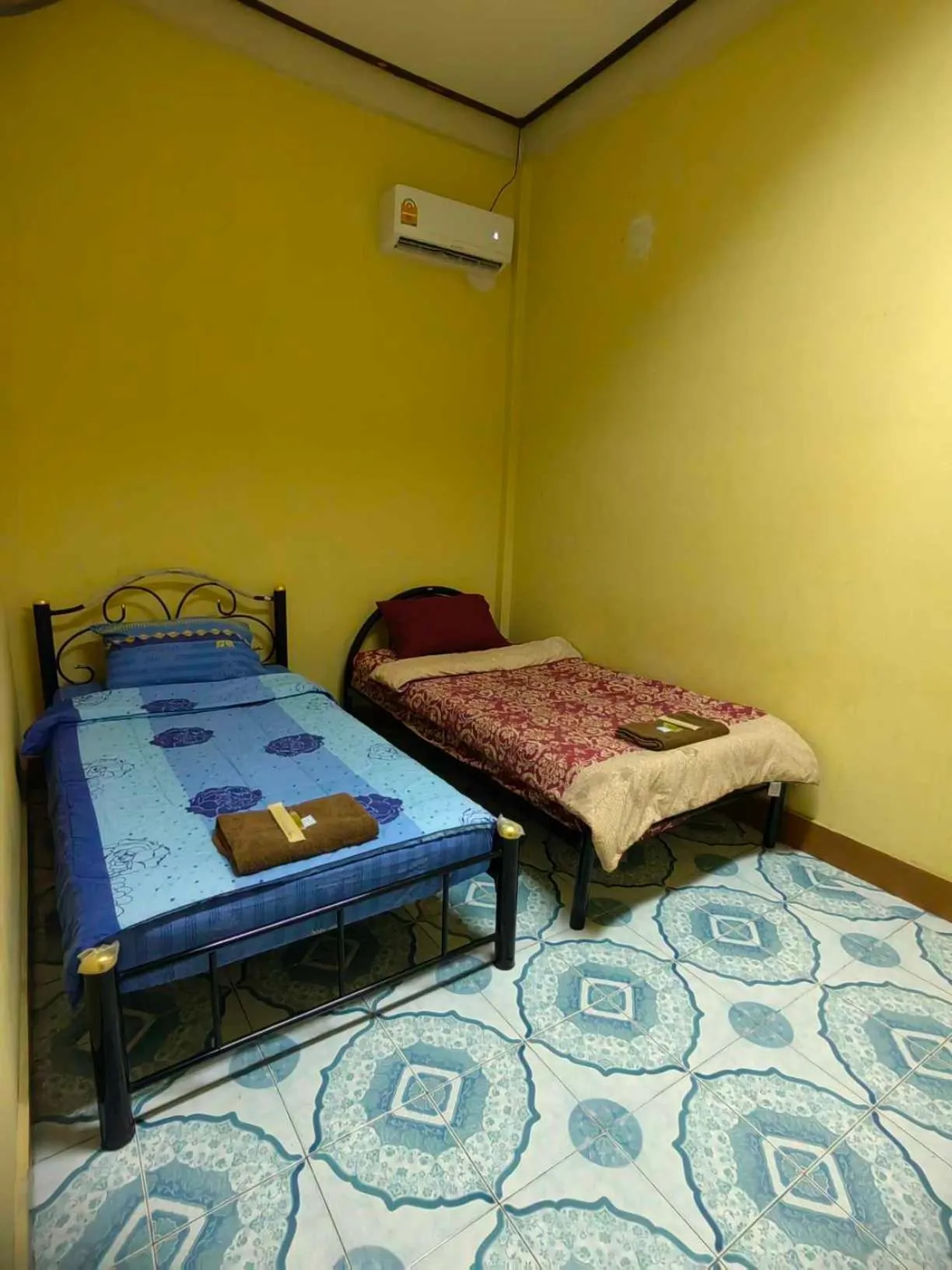 Bed in Mabuhay Guest House, Thai Embassy Vientiane