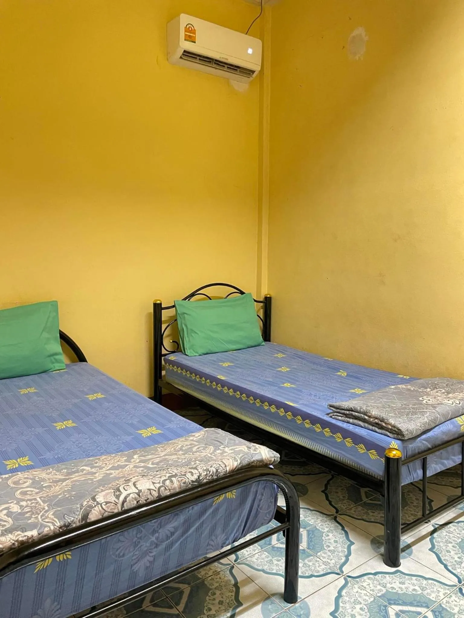 Bed in Mabuhay Guest House, Thai Embassy Vientiane