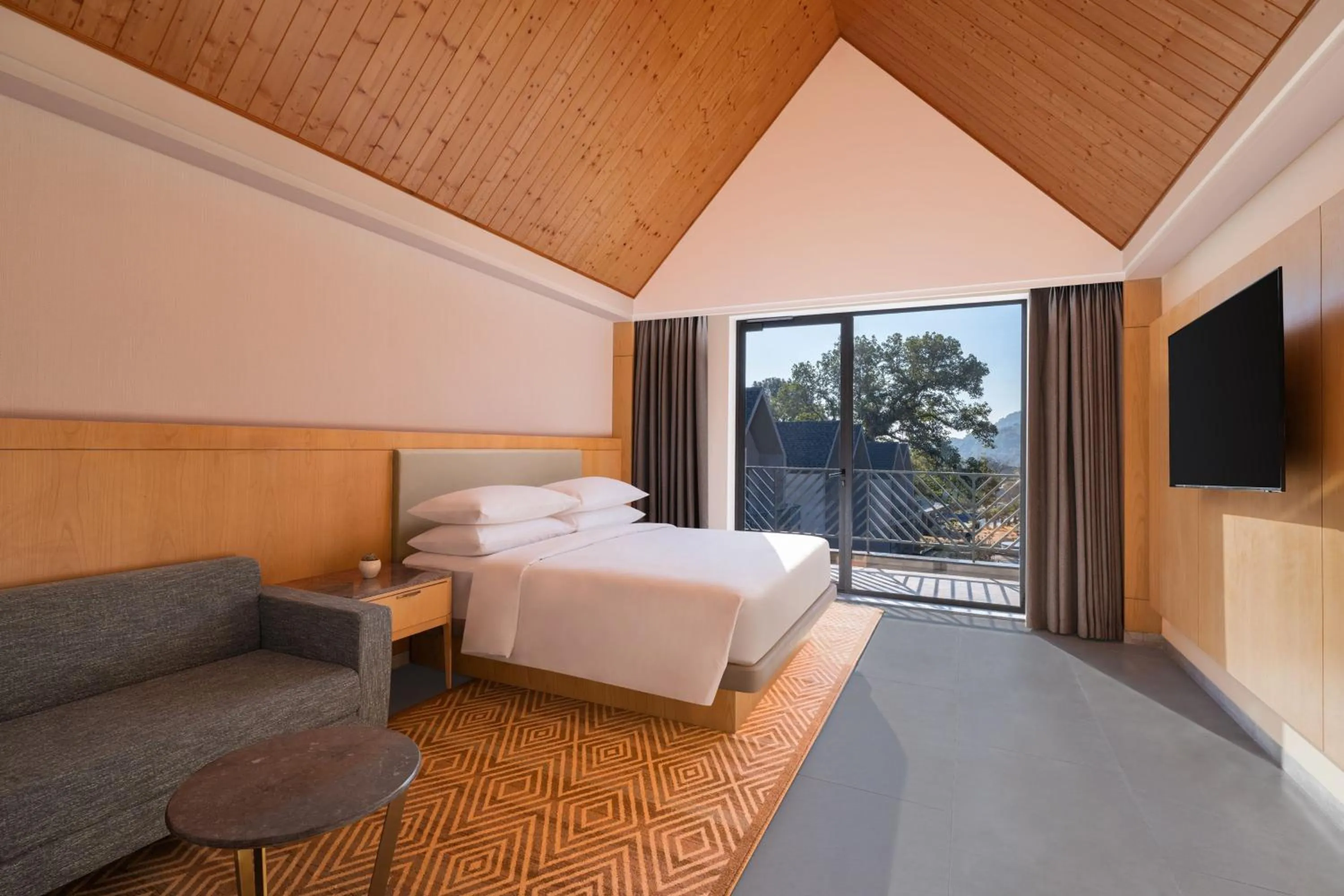 Living room, Bed in Katra Marriott Resort & Spa