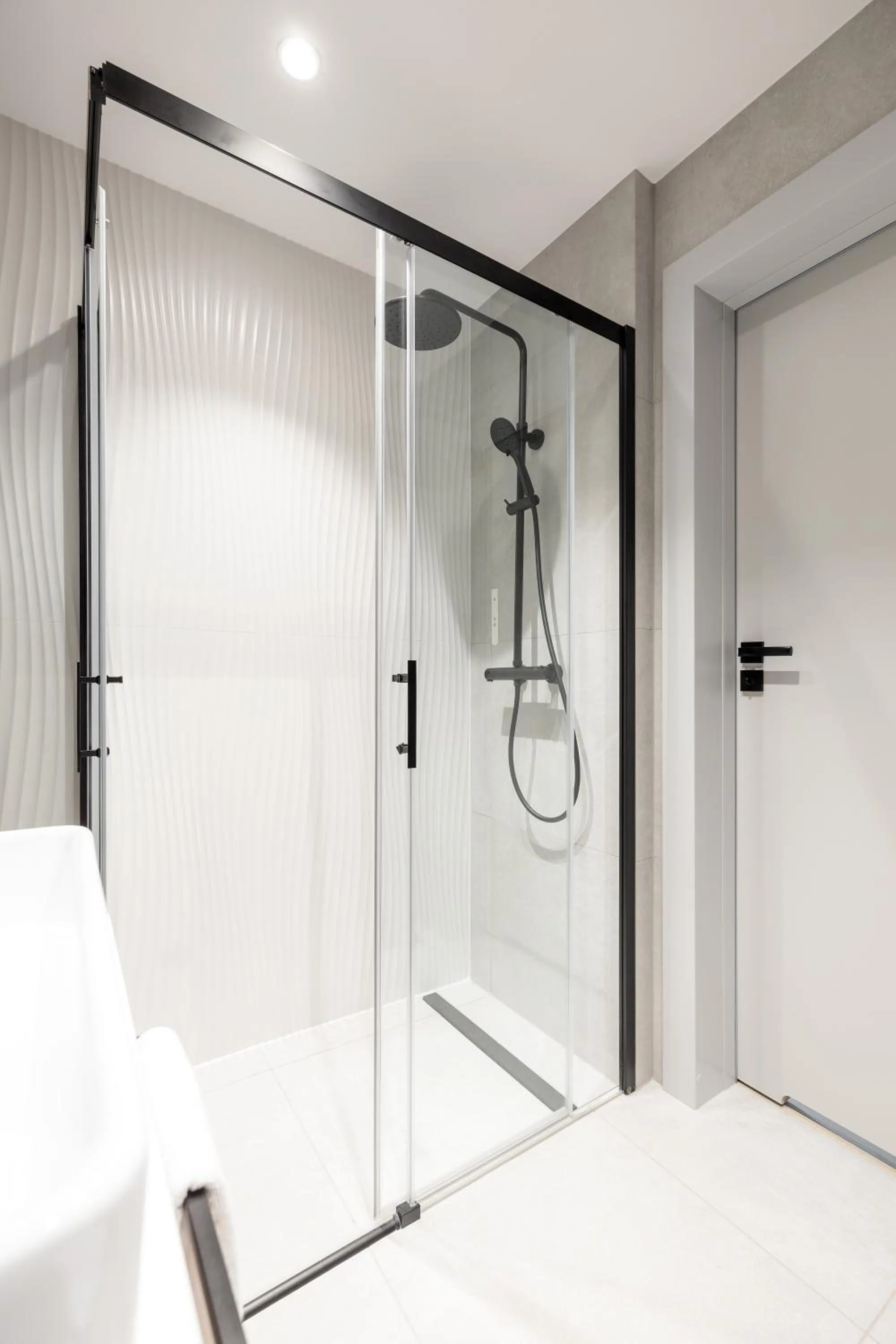 Shower in Baltic Waves Resort by PI Apartments - Official Operator