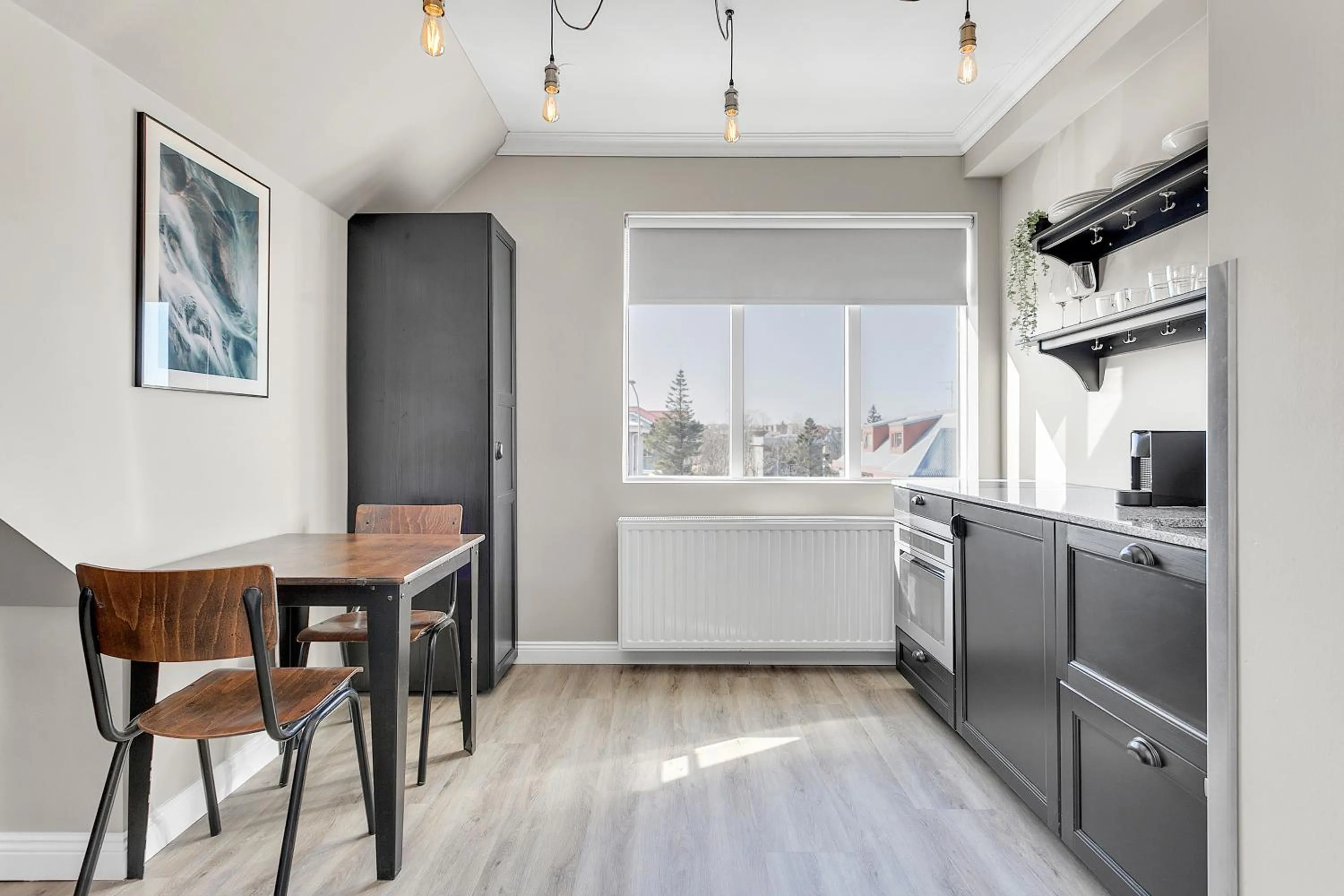 Kitchen or kitchenette in ODDSSON Downtown Hotel