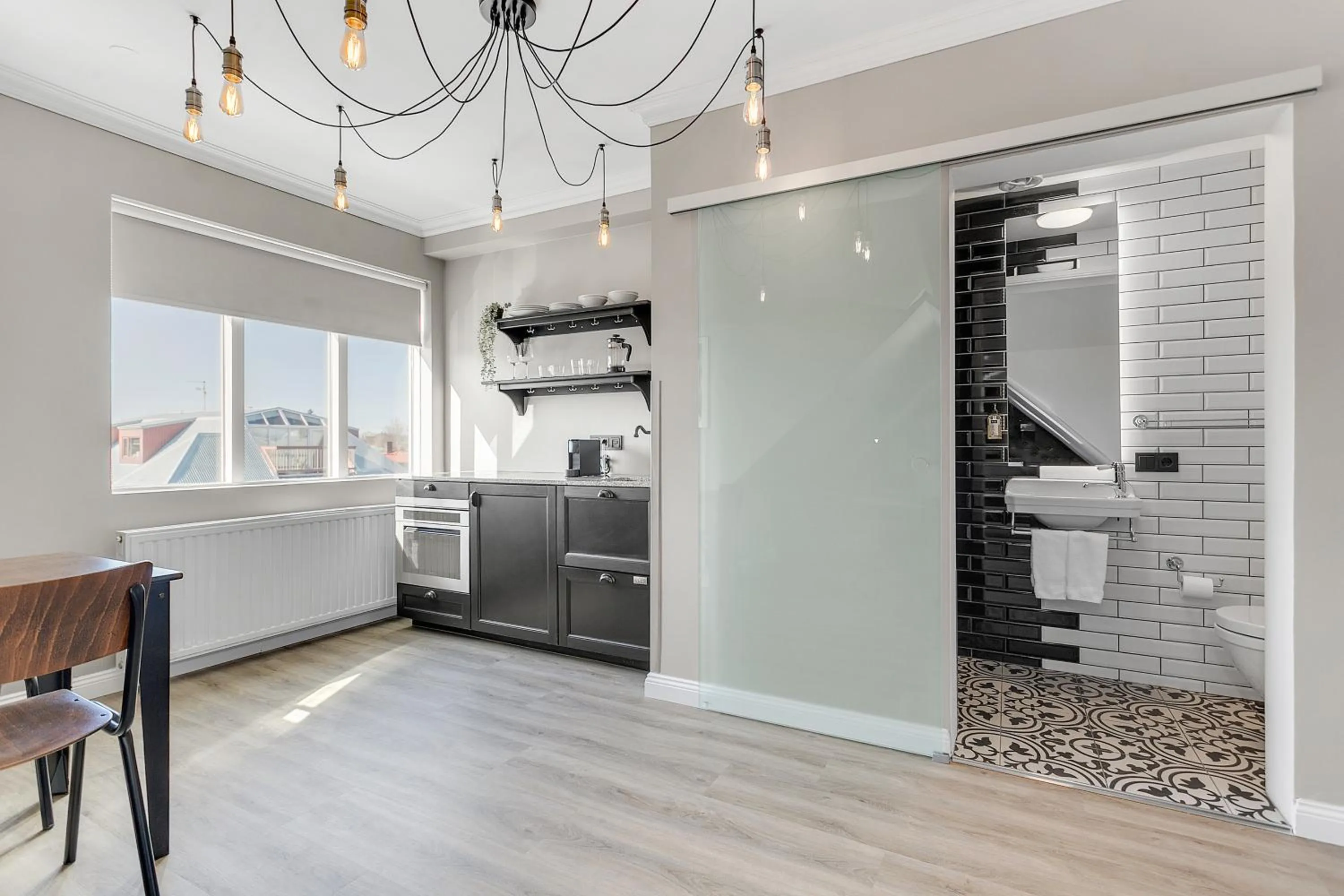 Kitchen or kitchenette in ODDSSON Downtown Hotel